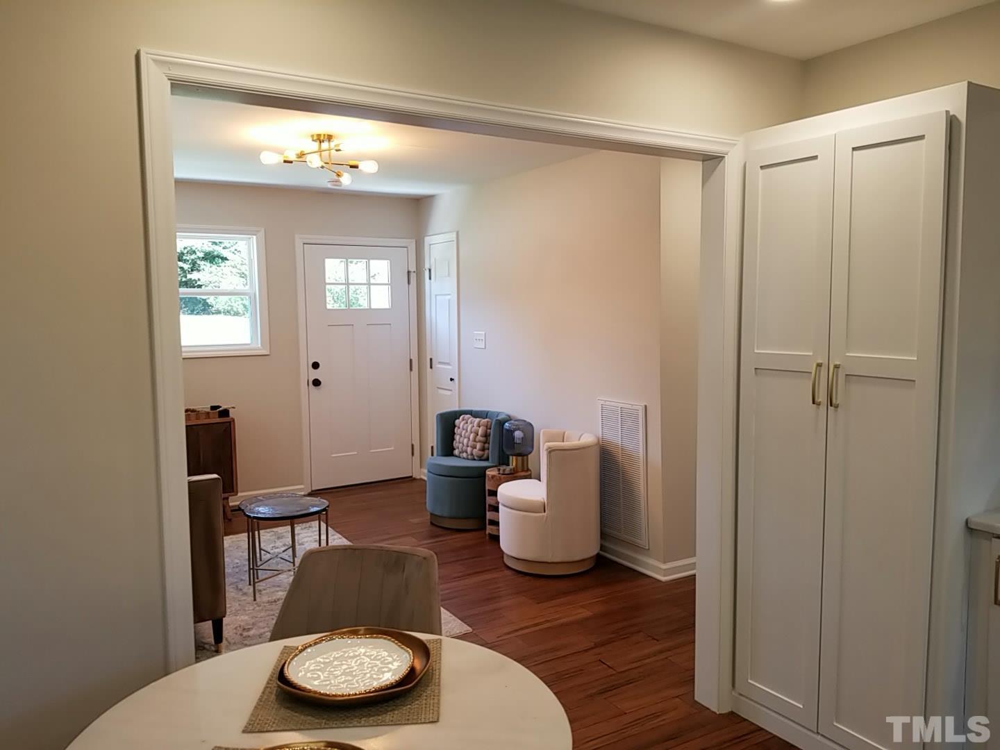 1706 Capps Street Durham, NC 27707 - Photo 12 of 31 a living room with furniture and a table
