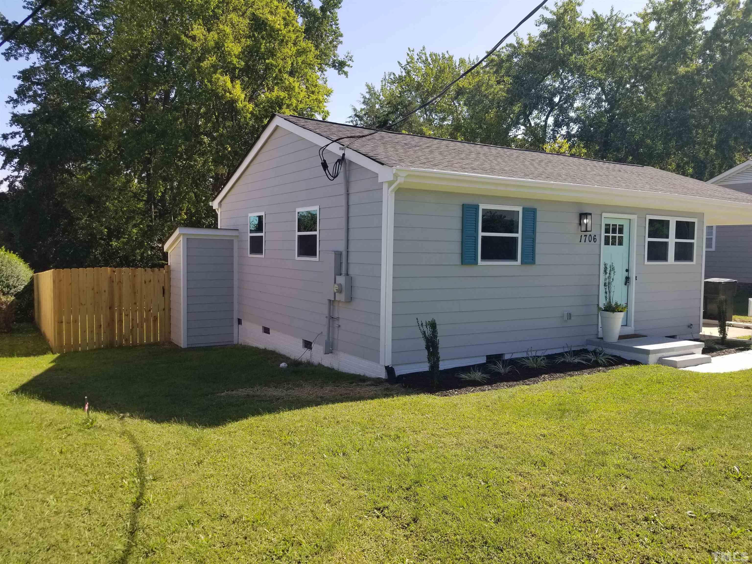 1706 Capps Street Durham, NC 27707 - Photo 24 of 31 a view of a backyard with a garden