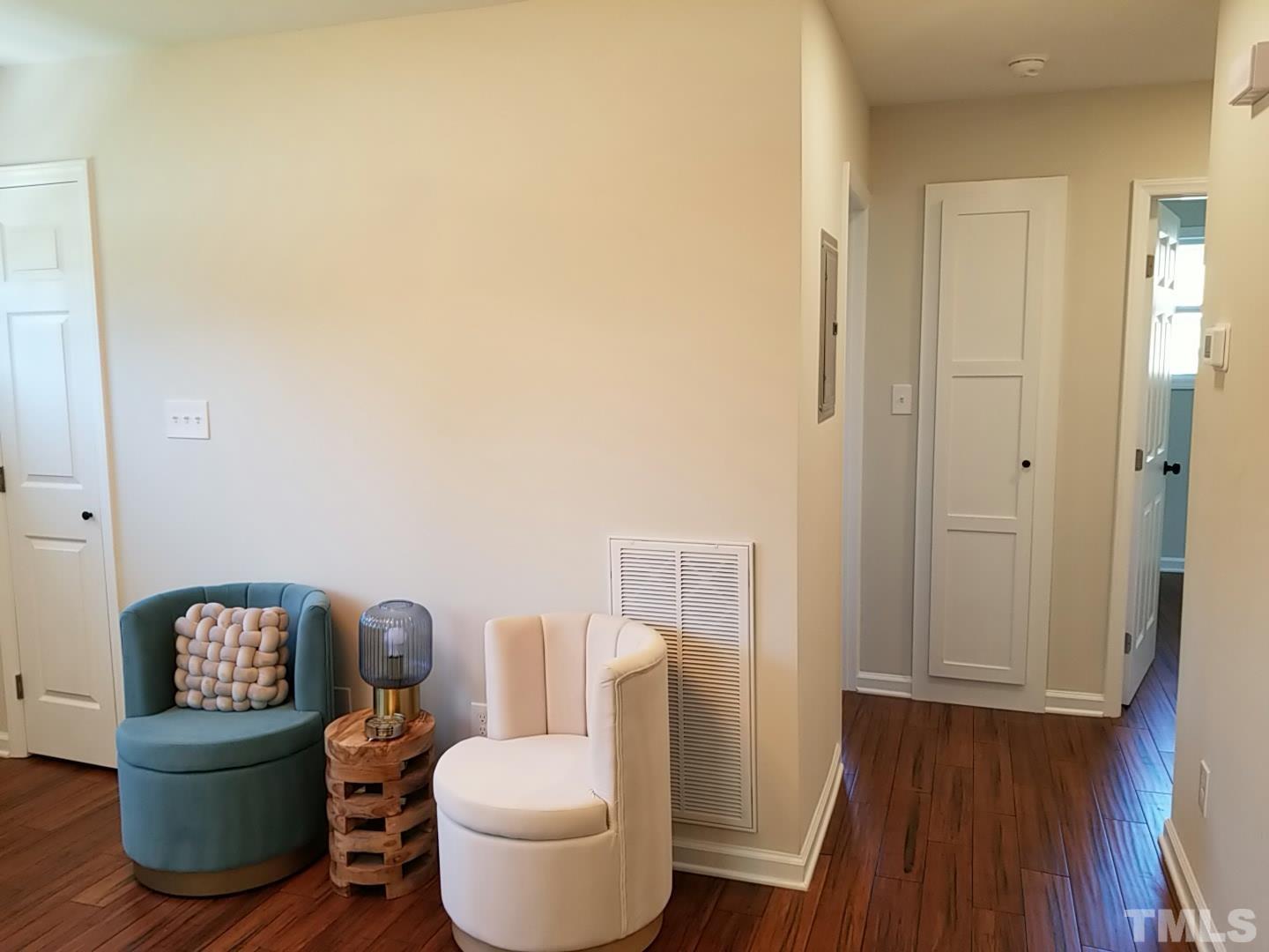 1706 Capps Street Durham, NC 27707 - Photo 8 of 31 a bathroom with a toilet and a mirror
