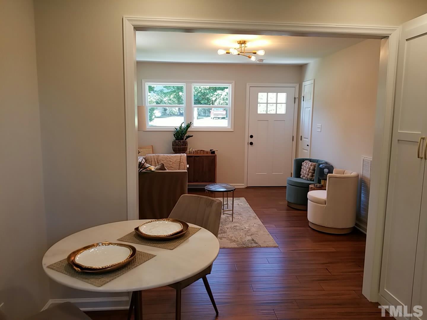 1706 Capps Street Durham, NC 27707 - Photo 10 of 31 a living room with furniture and a window