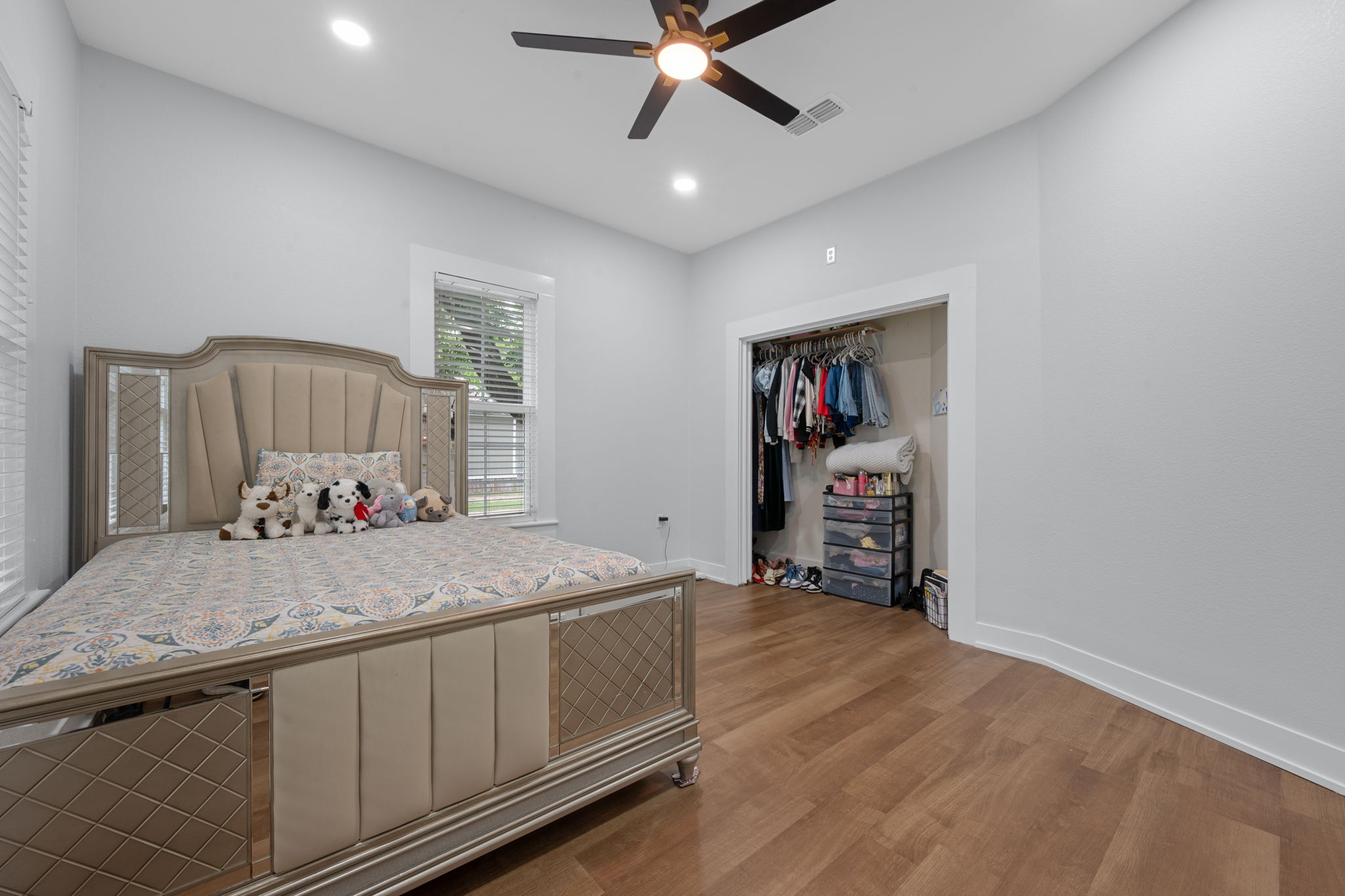 602 East 6th Street Cameron, TX 76520 - Photo 31 of 40 Spacious room featuring wood-finish flooring, light grey walls, and a recessed lighting fixture