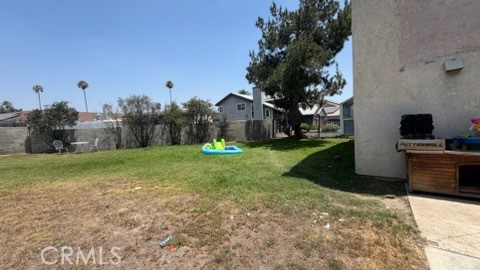 2478 KOA Drive Rialto, CA 92377 - Photo 13 of 18 a view of a house with a yard