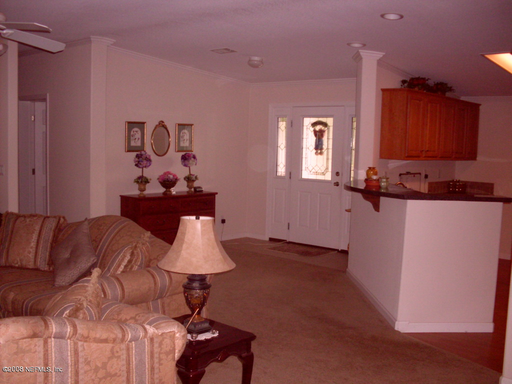 694 Dave Brown Road St. George, GA 31562 - Photo 14 of 19 Living Room to Front Door