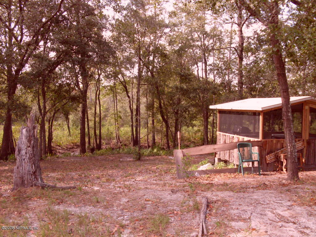 694 Dave Brown Road St. George, GA 31562 - Photo 4 of 19 Summer Kitchen/Barbeque