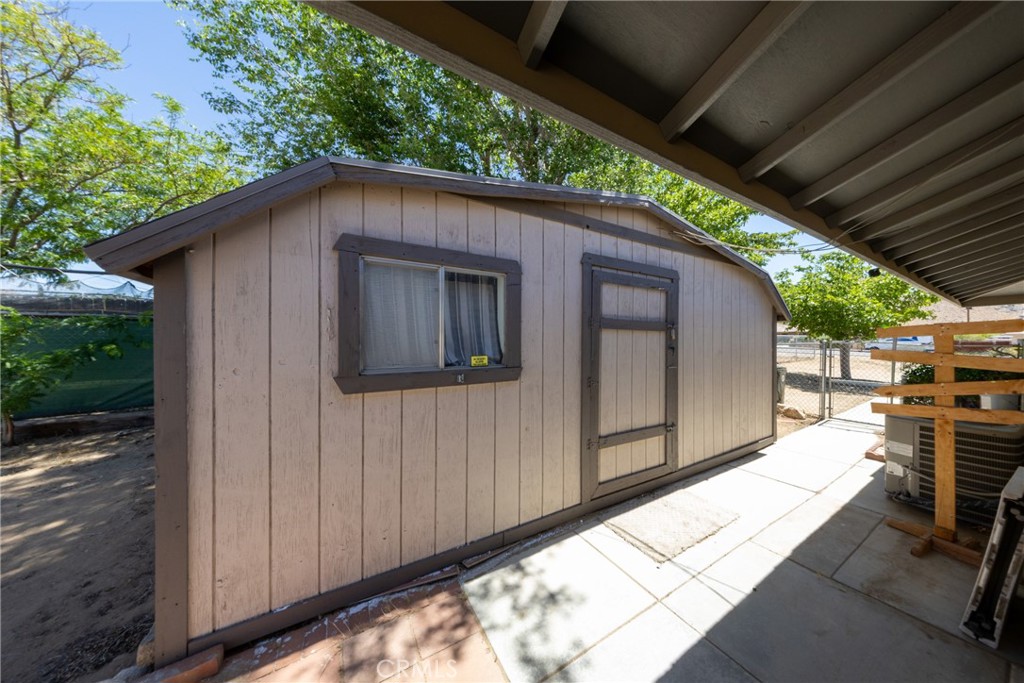 19388 Corwin Road Apple Valley, CA 92307 - Photo 32 of 36 The shed is dry walled with carpet,A/C and ceiling fan.