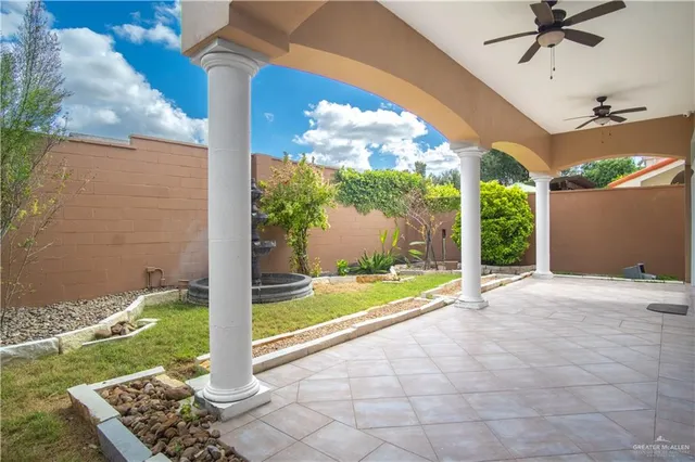 a view of a porch and garden