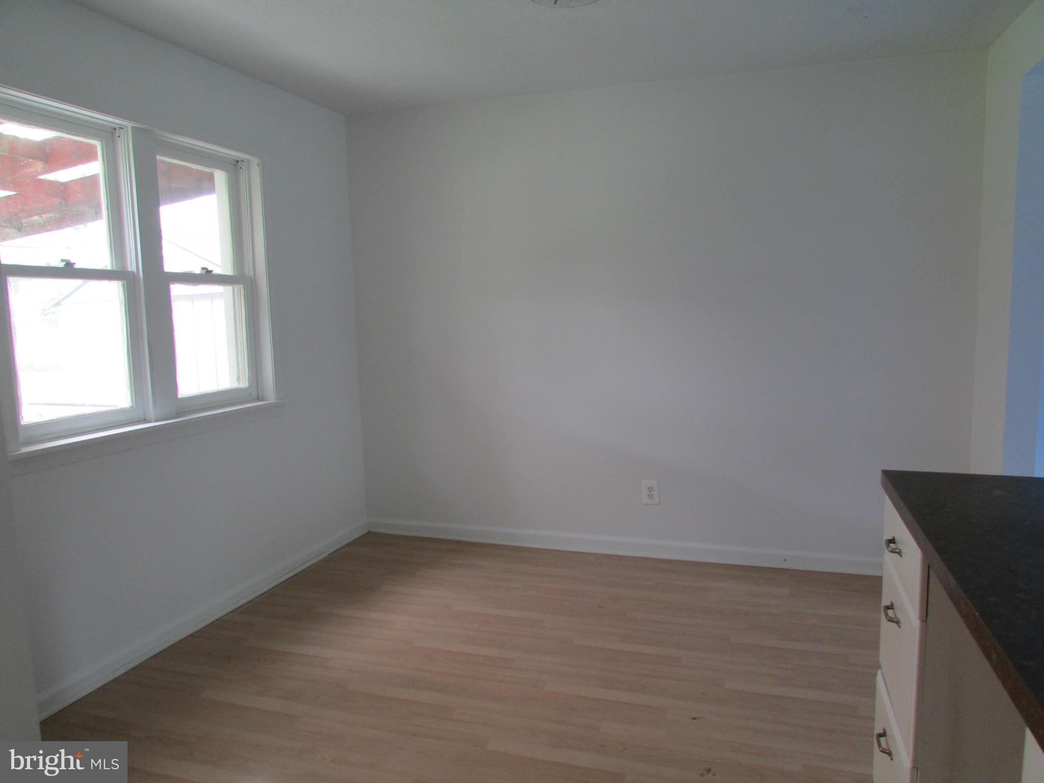 600 Meadow Road Baltimore, MD 21206 - Photo 6 of 13 an empty room with a window