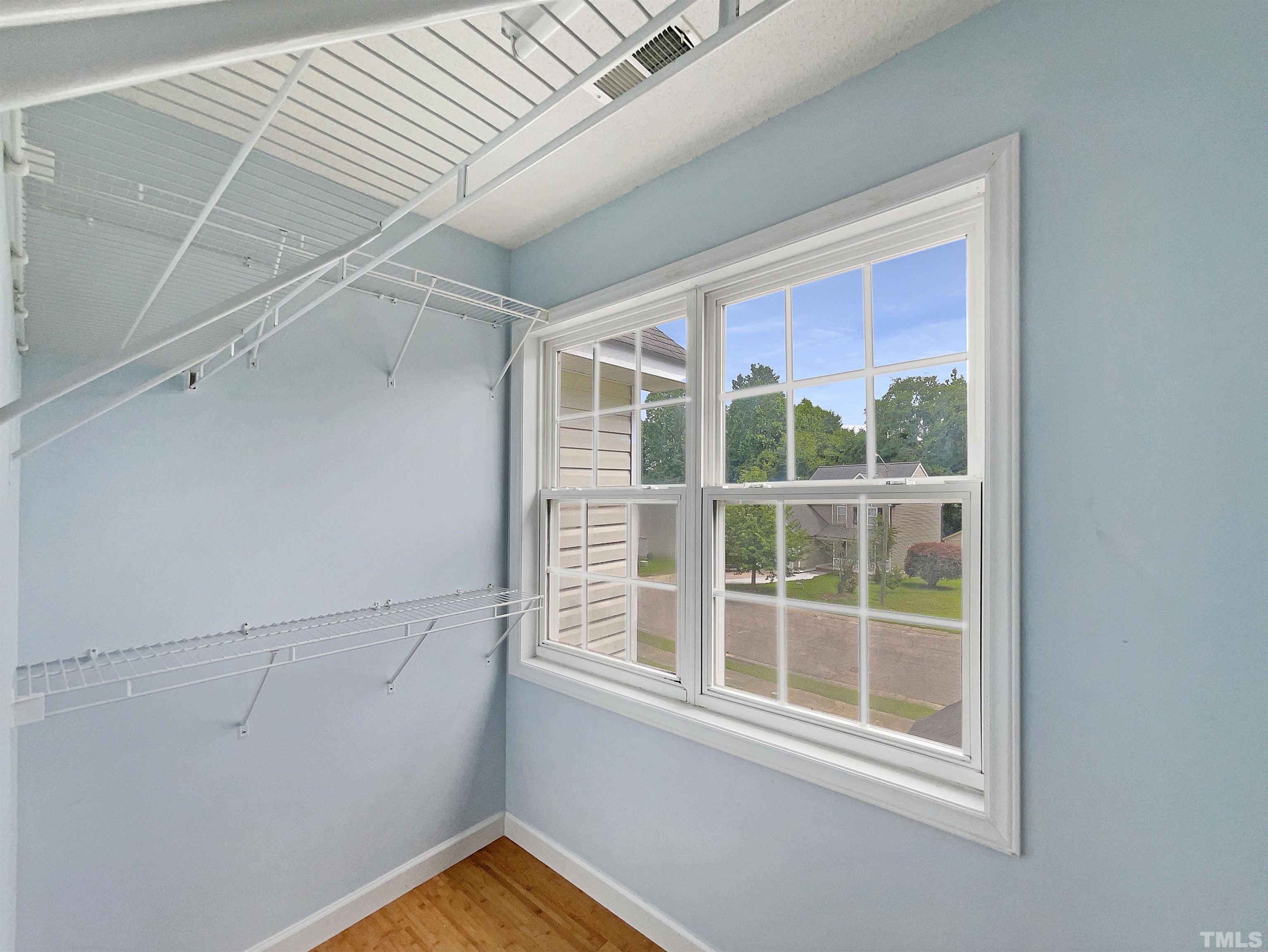 5720 Tealbrook Drive Raleigh, NC 27610 - Photo 12 of 17 a view of a window in an empty room