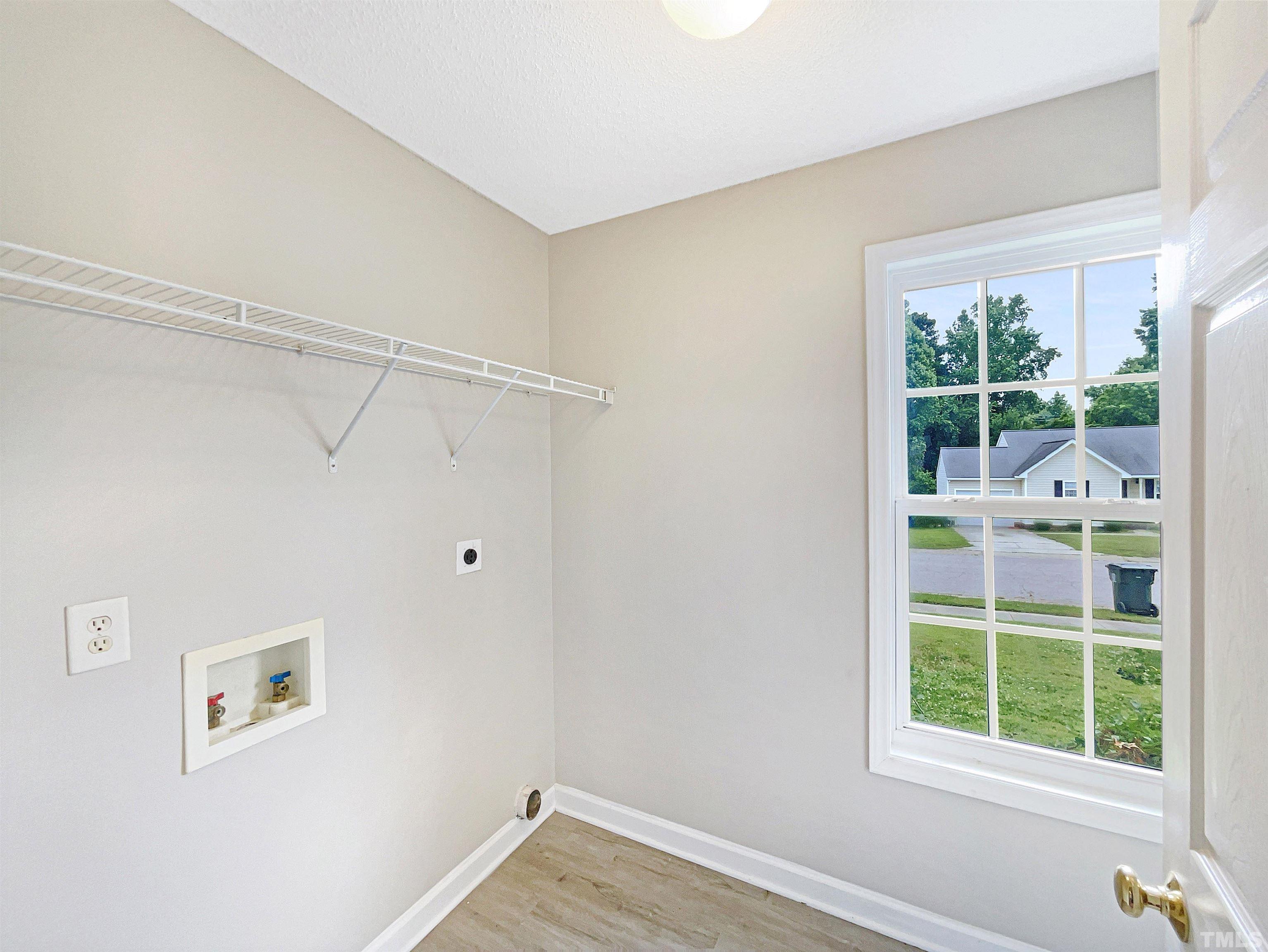 5720 Tealbrook Drive Raleigh, NC 27610 - Photo 14 of 17 a view of an empty room with a window
