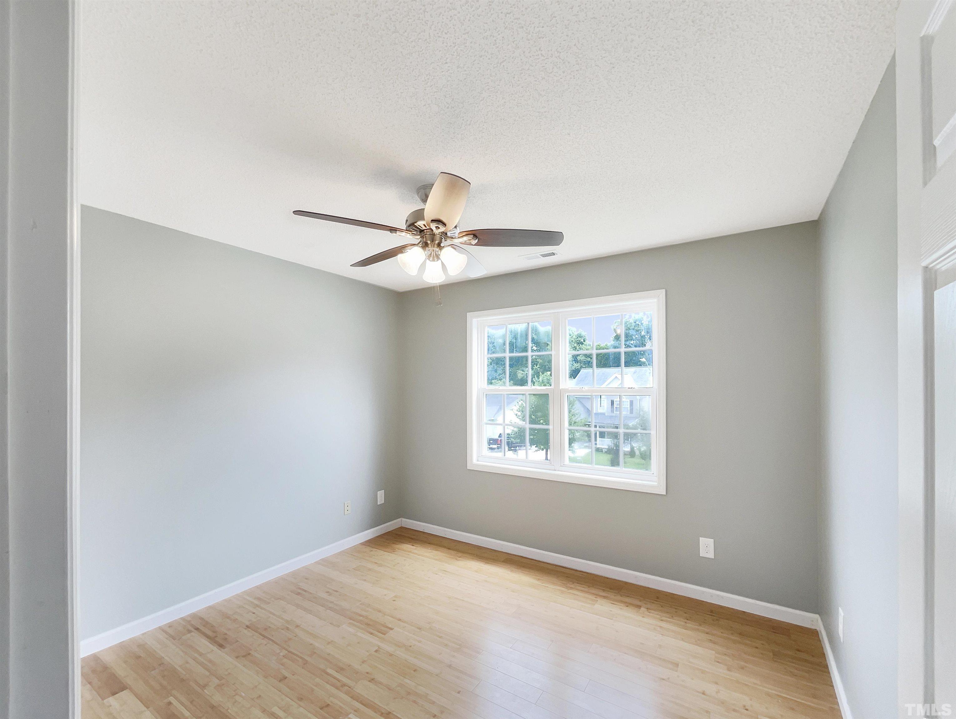 5720 Tealbrook Drive Raleigh, NC 27610 - Photo 10 of 17 a view of an empty room with a window