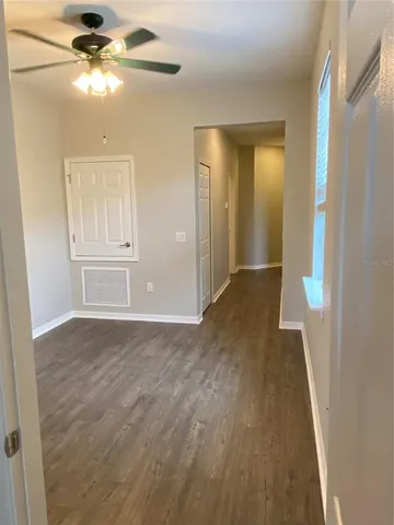 a view of a park with swings and slides