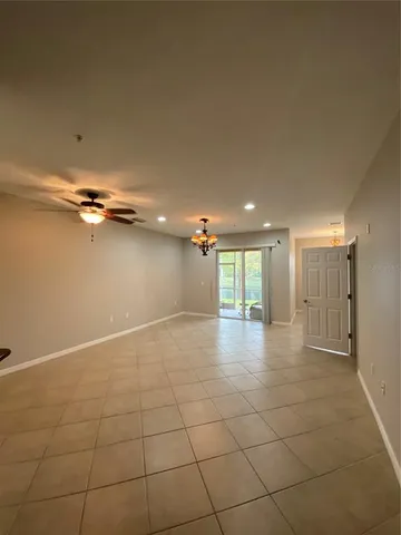 a room with a sink and a mirror