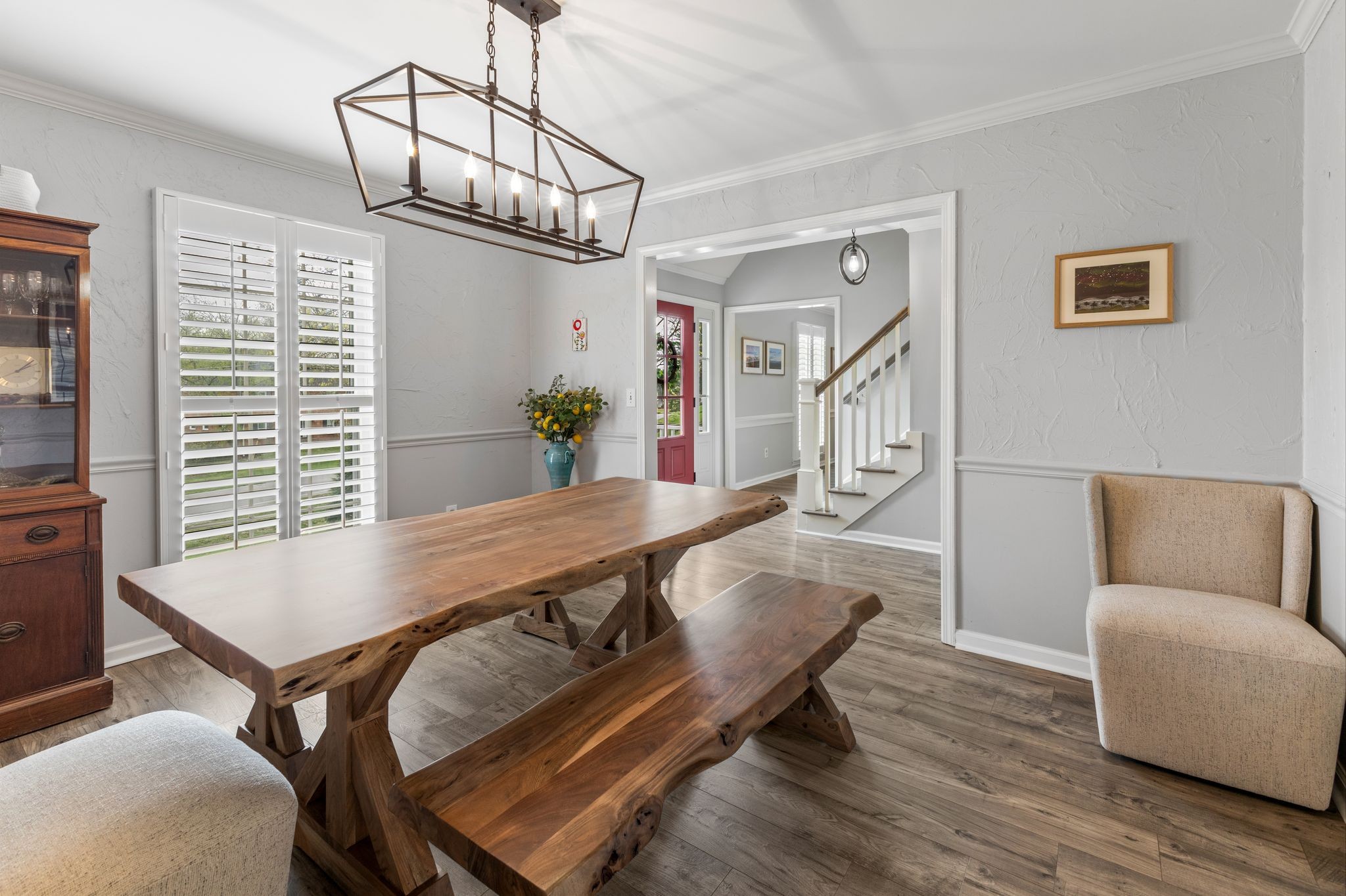 1517 Pinkerton Road Brentwood, TN 37027 - Photo 12 of 49 a living room with furniture and a chandelier