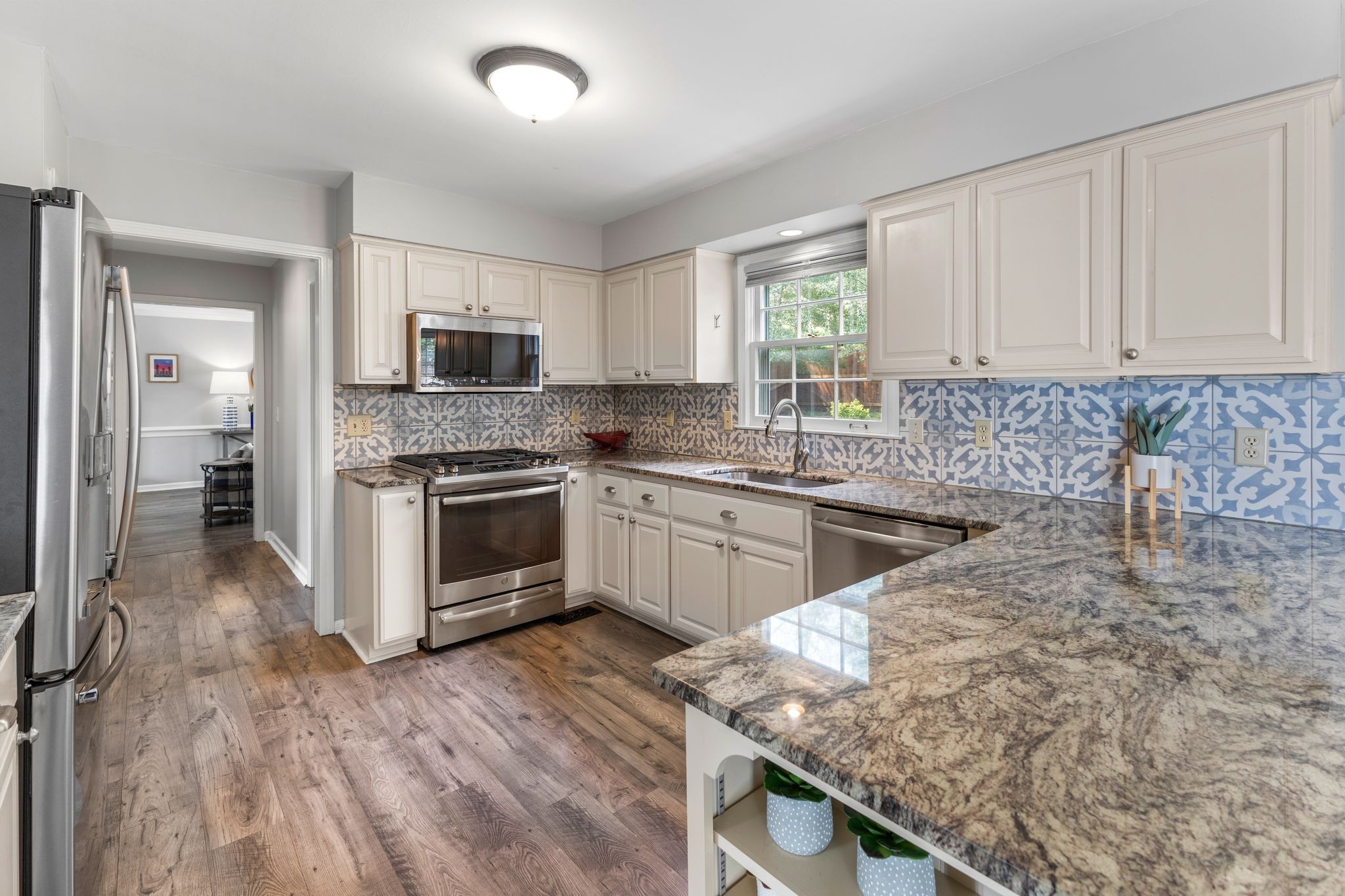 1517 Pinkerton Road Brentwood, TN 37027 - Photo 18 of 49 a kitchen with a sink cabinets and stainless steel appliances