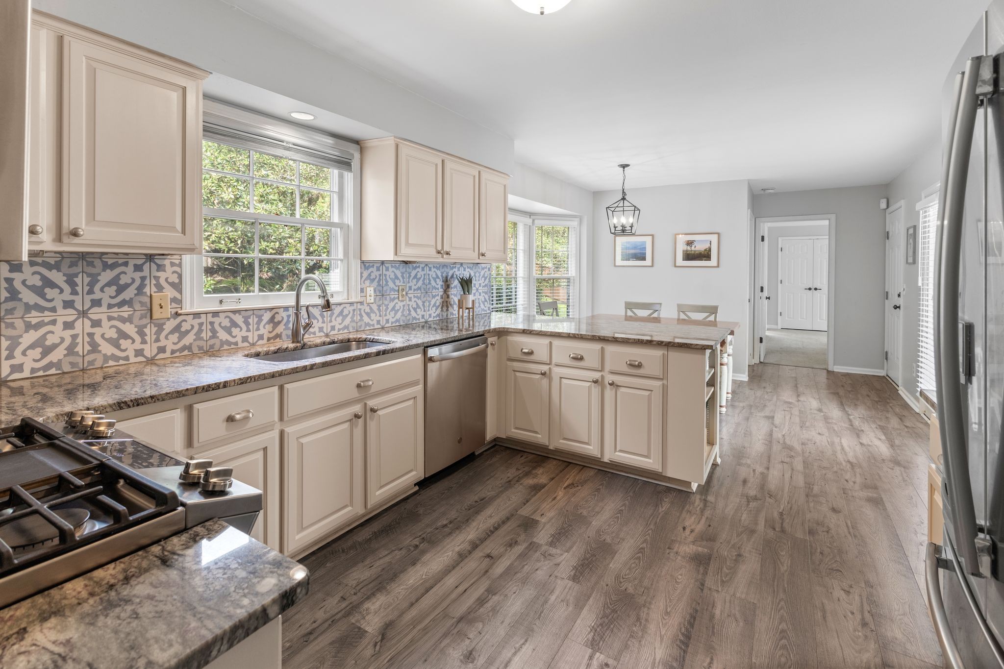 1517 Pinkerton Road Brentwood, TN 37027 - Photo 19 of 49 a kitchen with a sink stove and cabinets