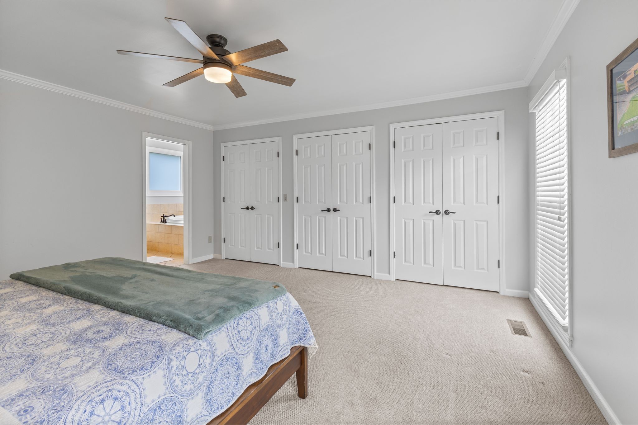 1517 Pinkerton Road Brentwood, TN 37027 - Photo 24 of 49 a view of a livingroom with a ceiling fan & cabinets