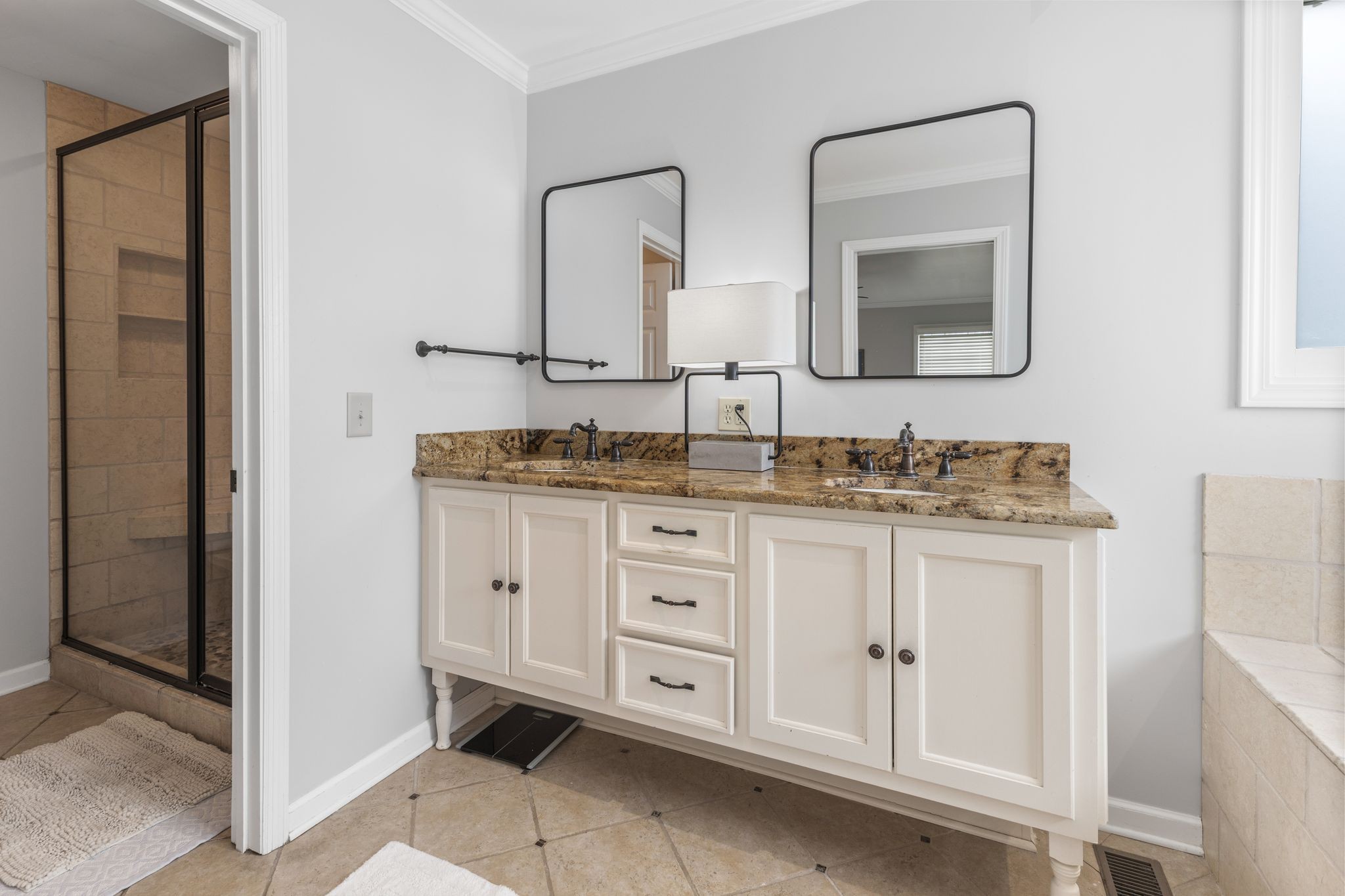 1517 Pinkerton Road Brentwood, TN 37027 - Photo 26 of 49 a bathroom with a granite countertop sink and a mirror