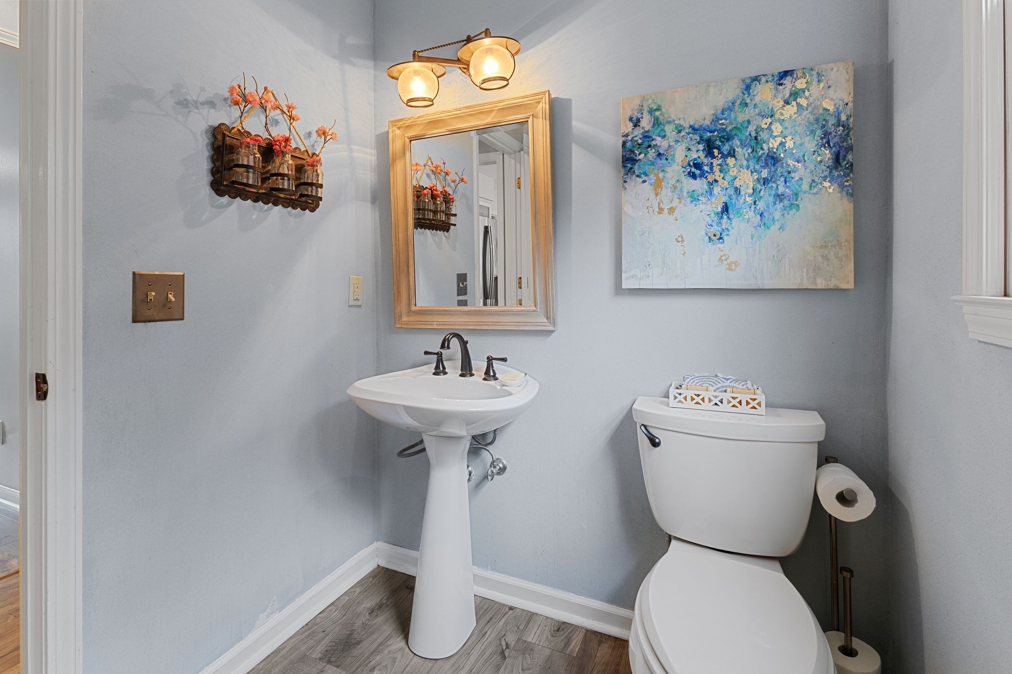 1517 Pinkerton Road Brentwood, TN 37027 - Photo 30 of 49 a bathroom with a toilet sink and mirror