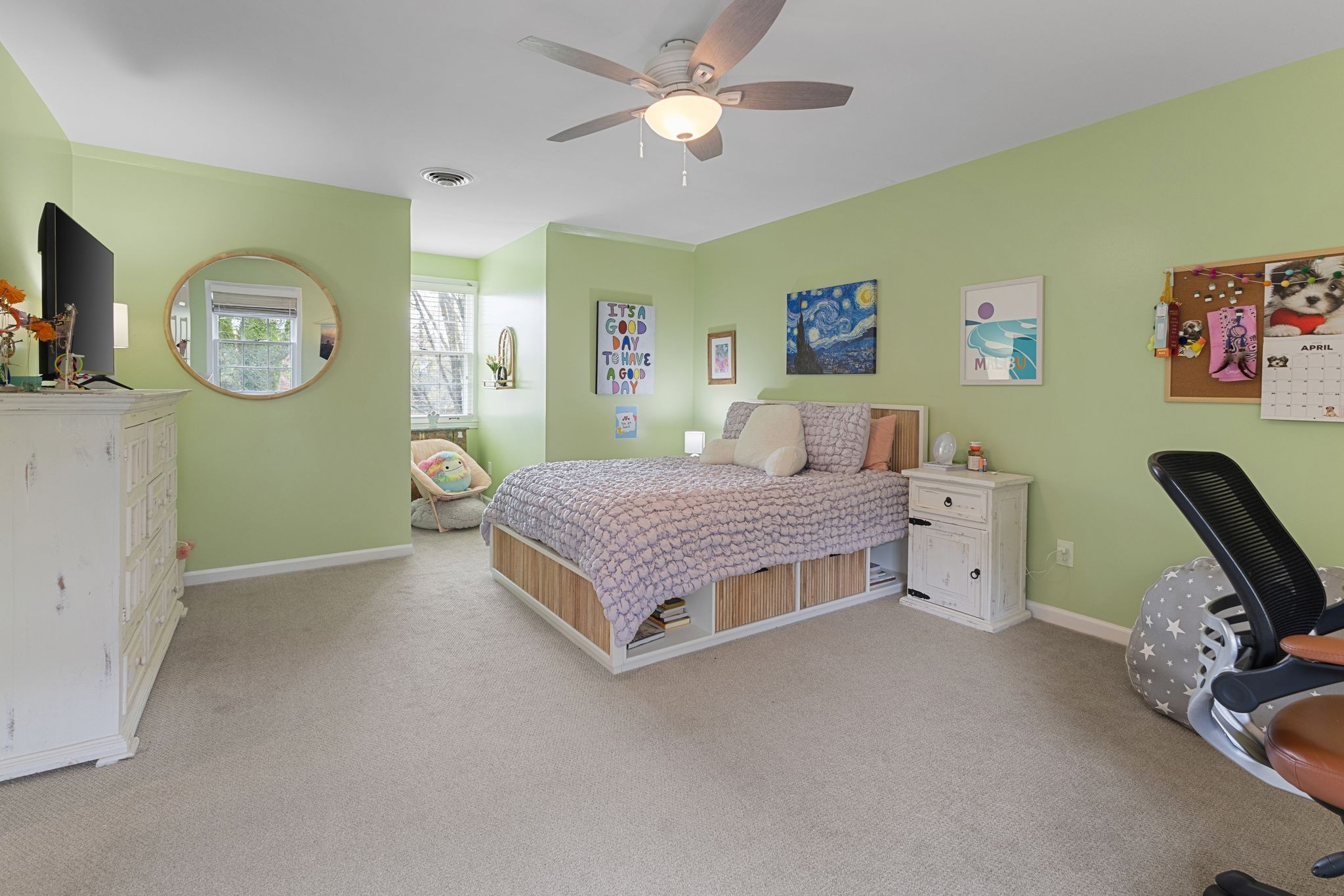 1517 Pinkerton Road Brentwood, TN 37027 - Photo 31 of 49 a bedroom with a bed and a chandelier