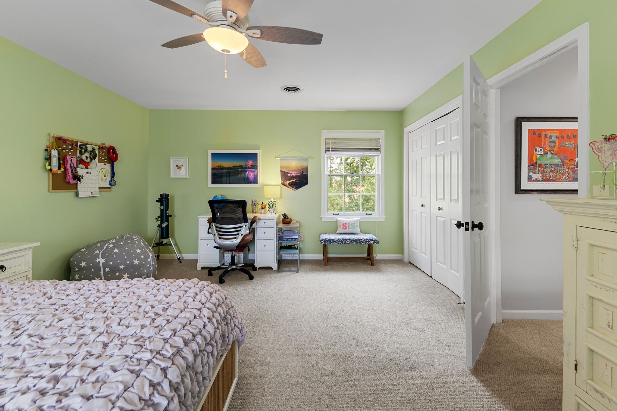 1517 Pinkerton Road Brentwood, TN 37027 - Photo 32 of 49 a bedroom with a bed and a chandelier