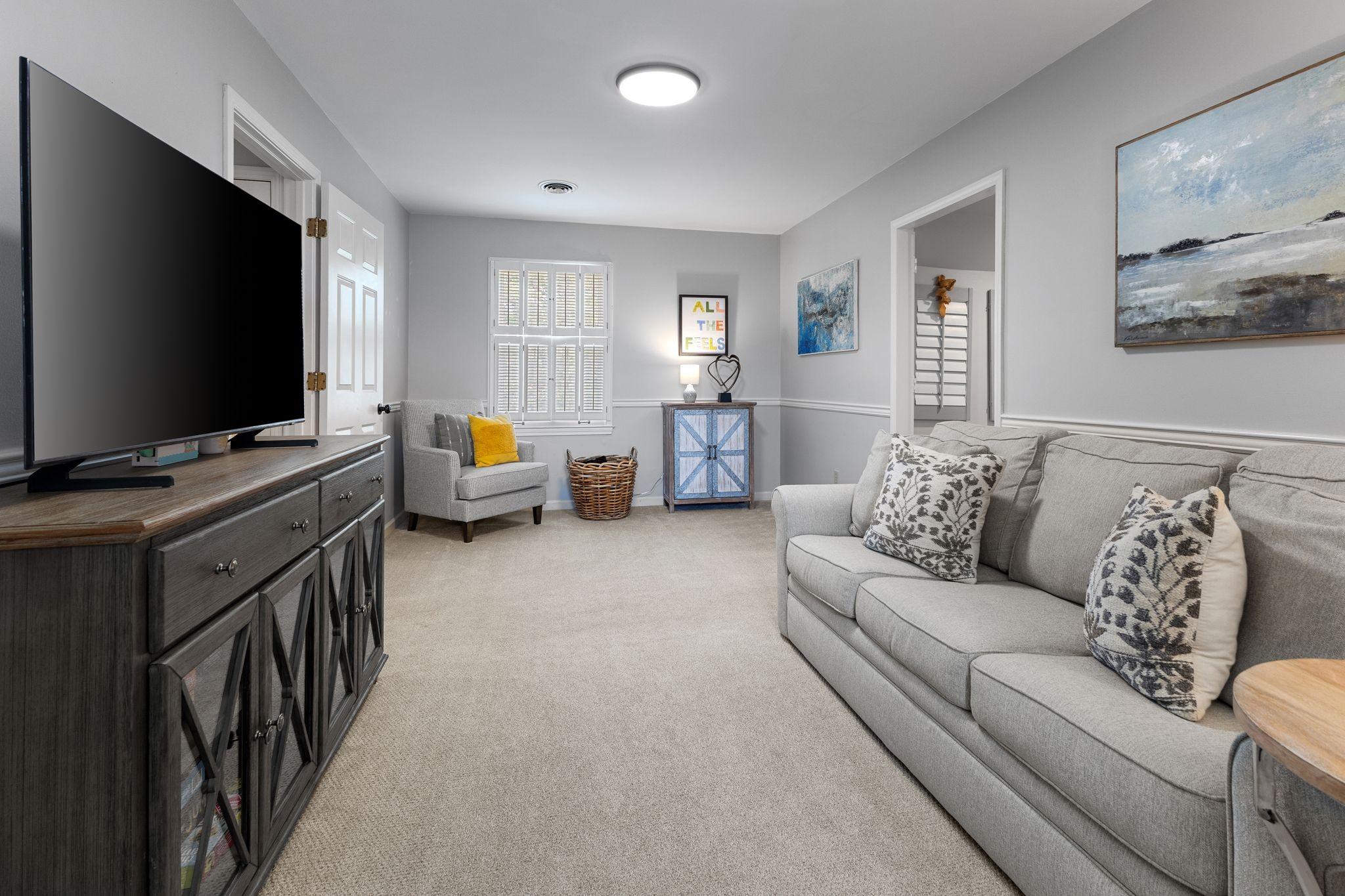 1517 Pinkerton Road Brentwood, TN 37027 - Photo 34 of 49 a living room with furniture and a flat screen tv