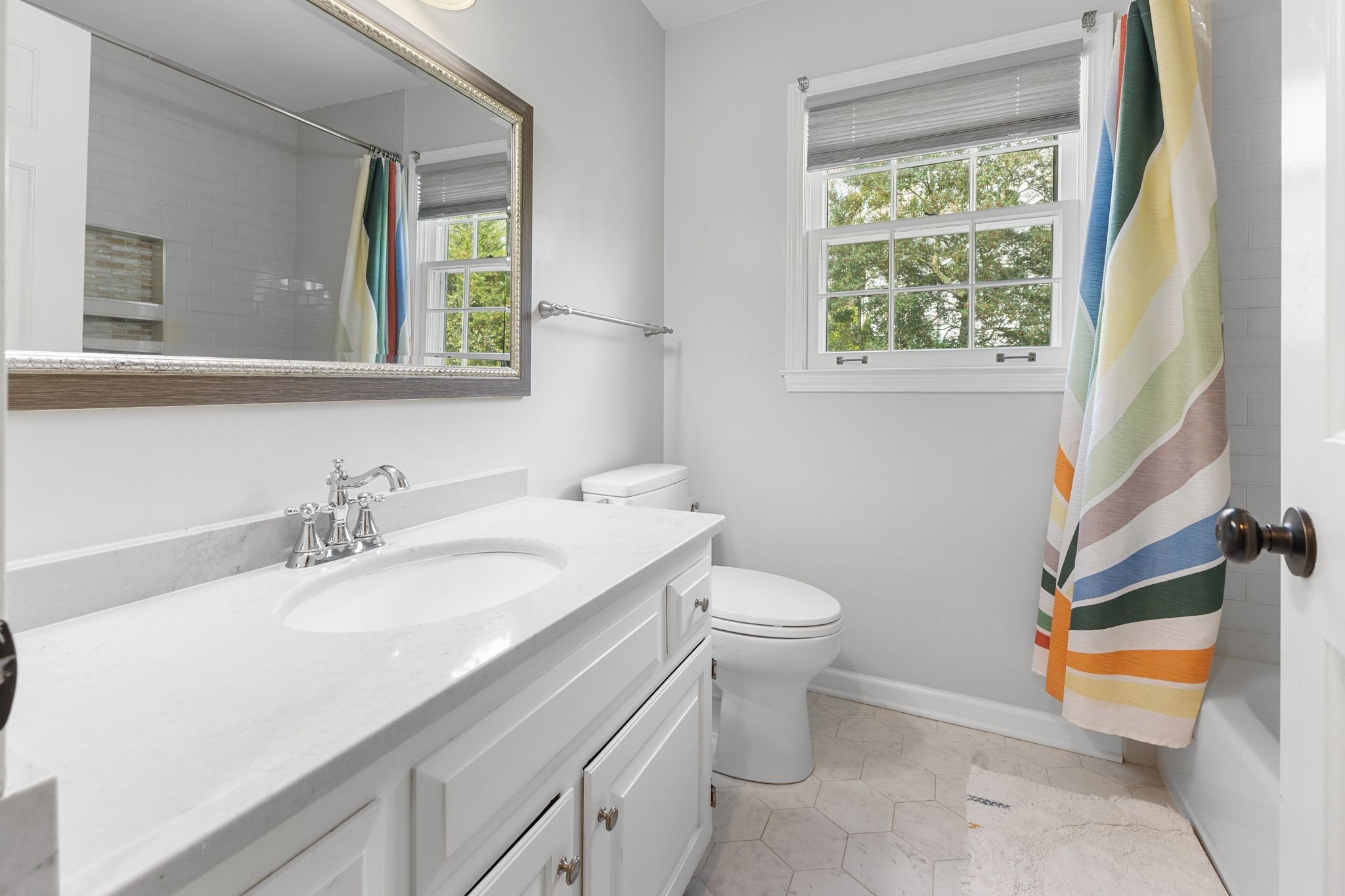 1517 Pinkerton Road Brentwood, TN 37027 - Photo 37 of 49 a bathroom with a sink and a mirror