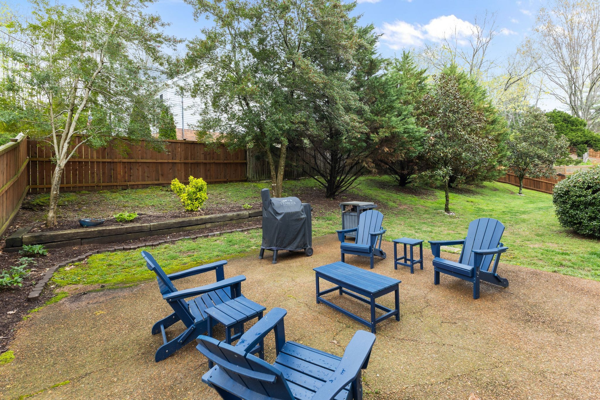 1517 Pinkerton Road Brentwood, TN 37027 - Photo 41 of 49 a backyard of a house with table and chairs