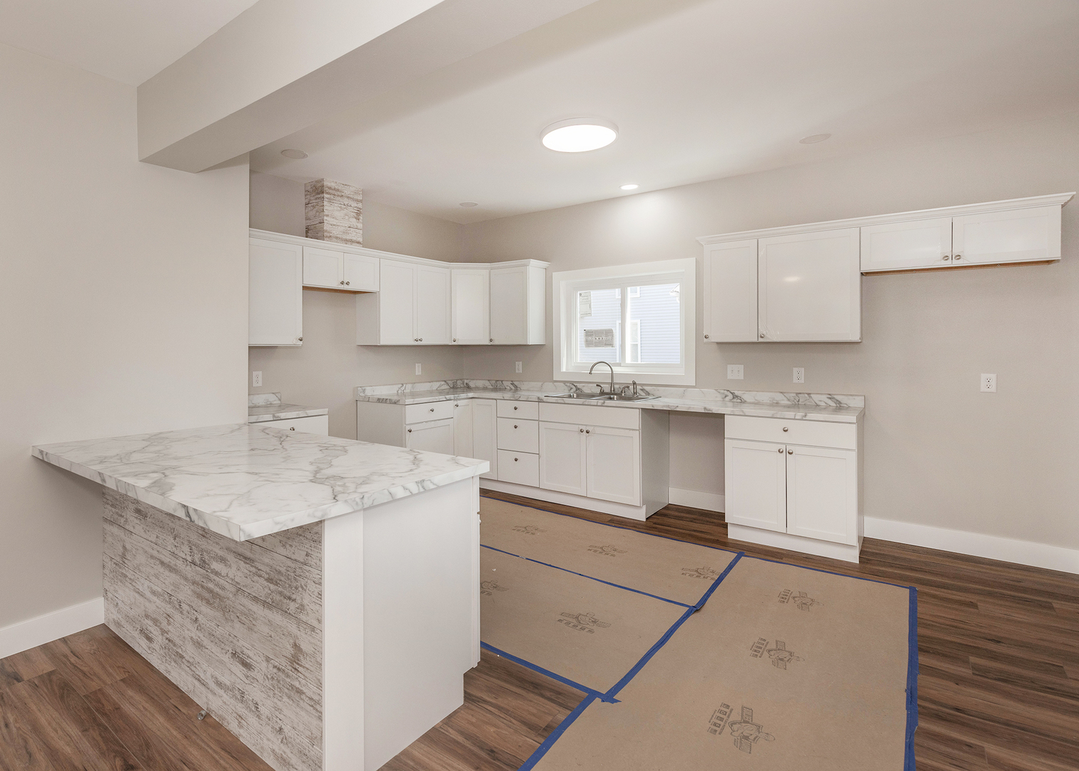 1212 14th Avenue Moline, IL 61265 - Photo 11 of 32 a kitchen with a sink stove and cabinets