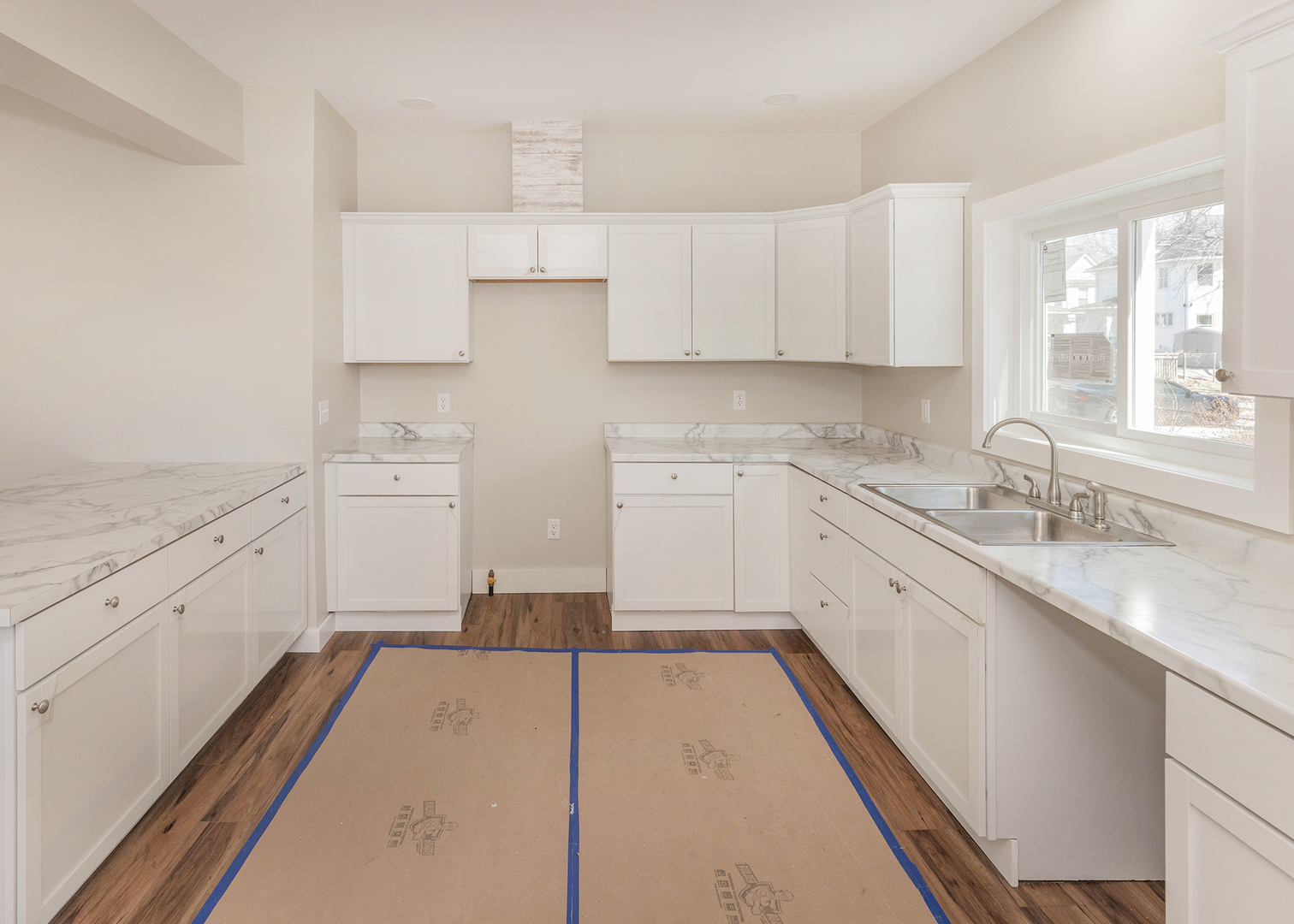 1212 14th Avenue Moline, IL 61265 - Photo 13 of 32 a kitchen with cabinets appliances and a sink