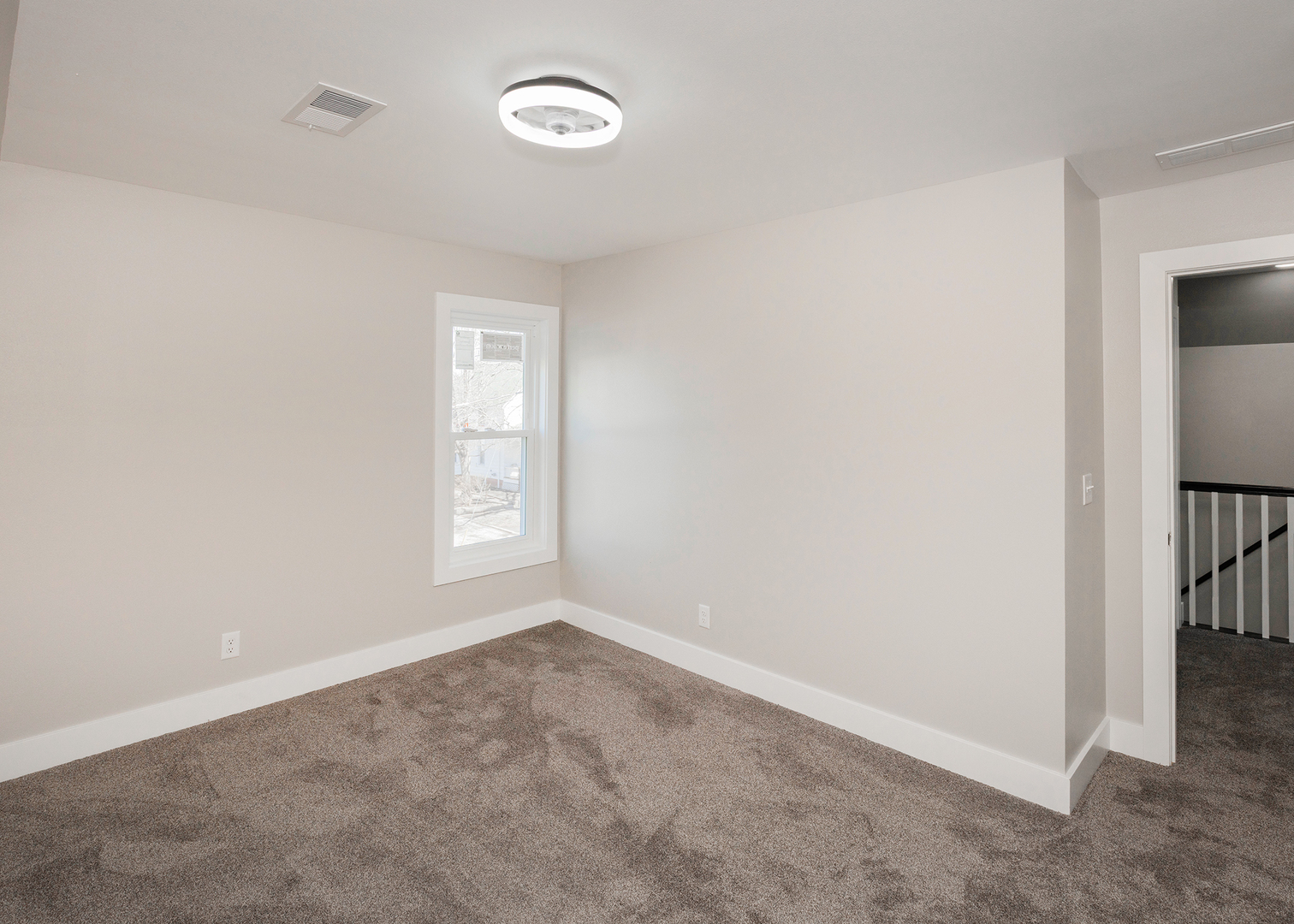 1212 14th Avenue Moline, IL 61265 - Photo 20 of 32 an empty room with a window