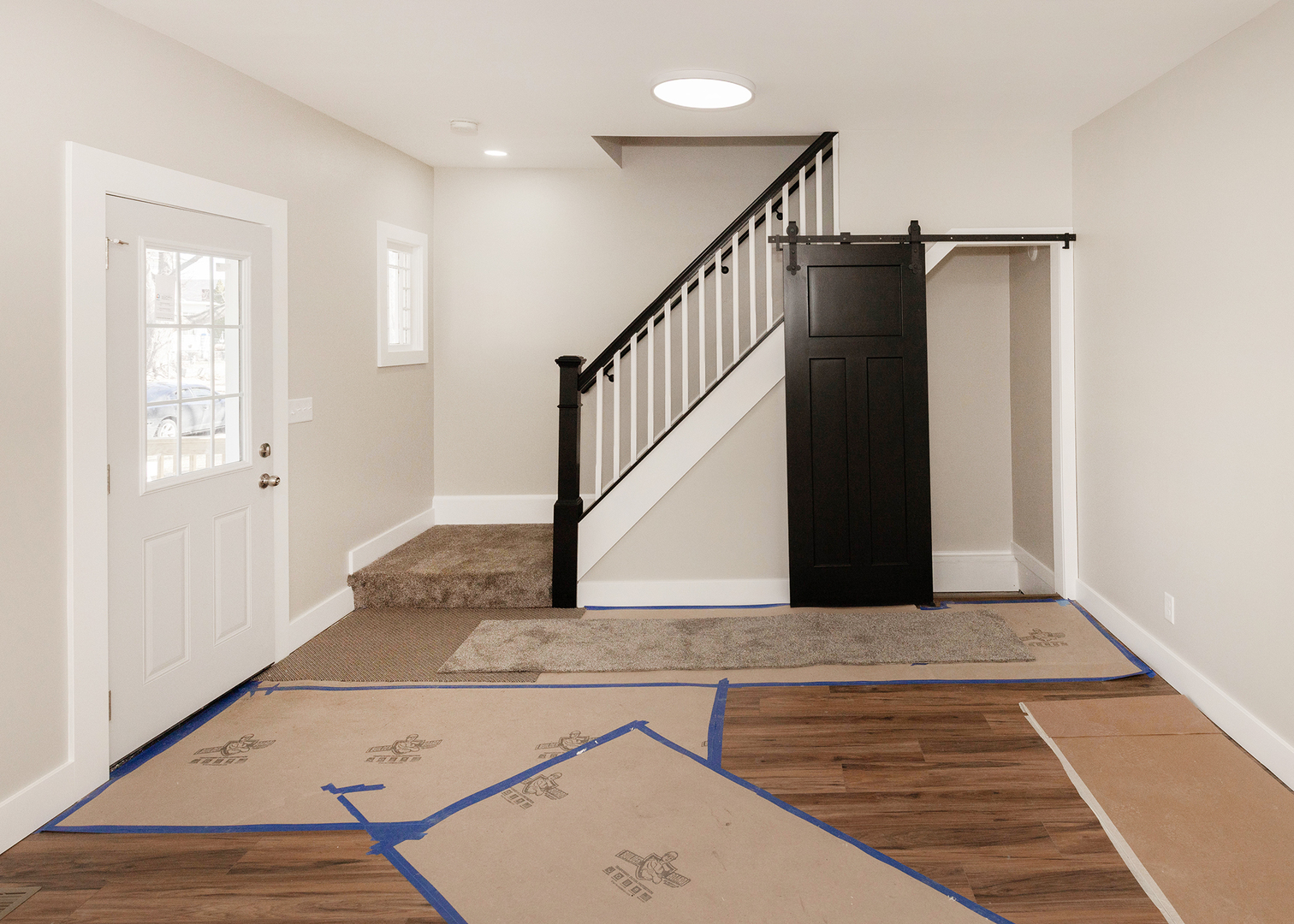 1212 14th Avenue Moline, IL 61265 - Photo 8 of 32 a view of entryway and hall with wooden floor