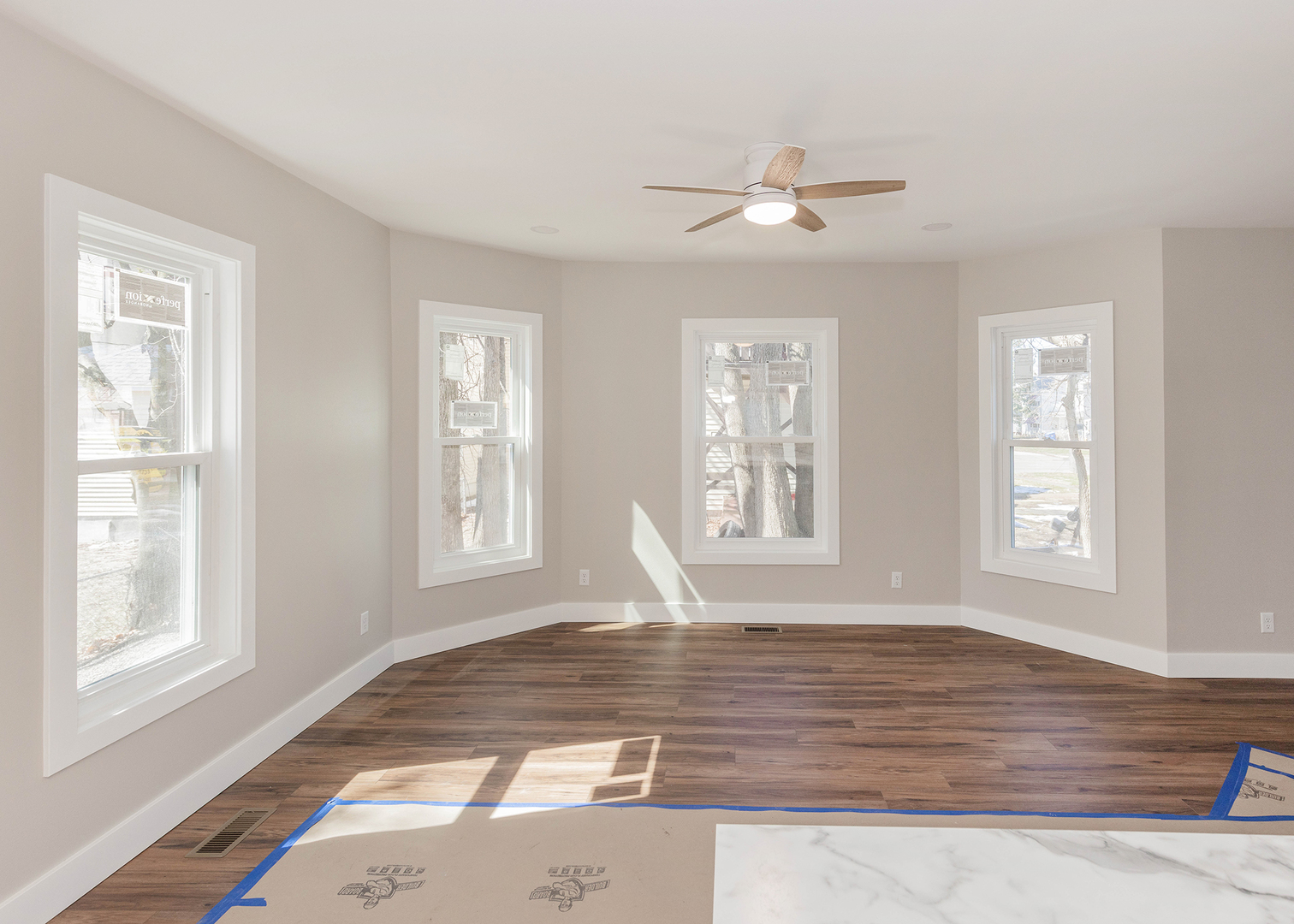 1212 14th Avenue Moline, IL 61265 - Photo 10 of 32 a view of empty room with wooden floor and fan