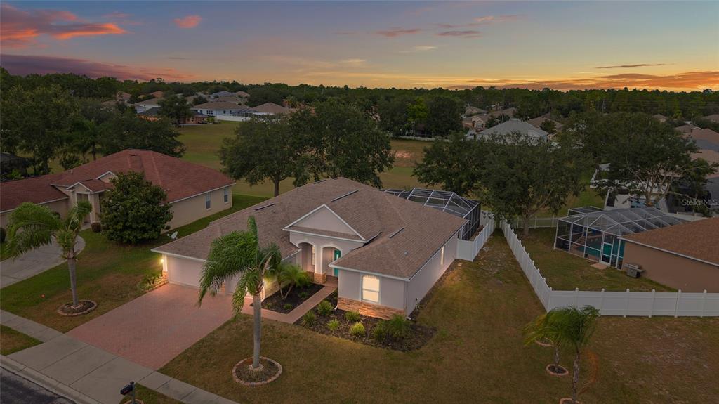 4925 Brightstone Place Spring Hill, FL 34609 - Photo 40 of 40 an aerial view of a house with a garden