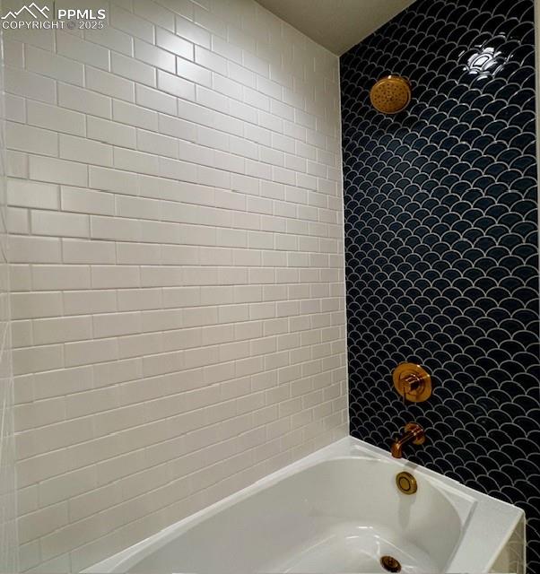 17737 Lemon Rye Loop Monument, CO 80132 - Photo 11 of 14 a bathroom with a bathtub