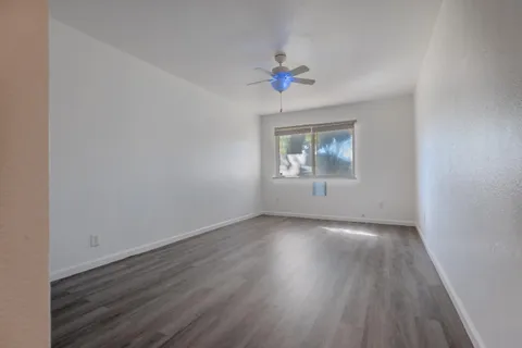 an empty room that has a window