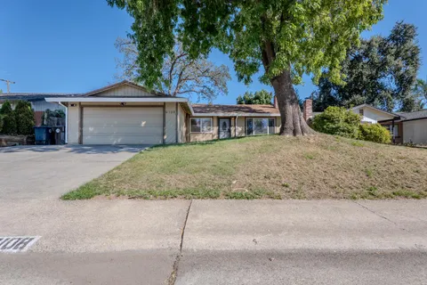 front view of house with a yard