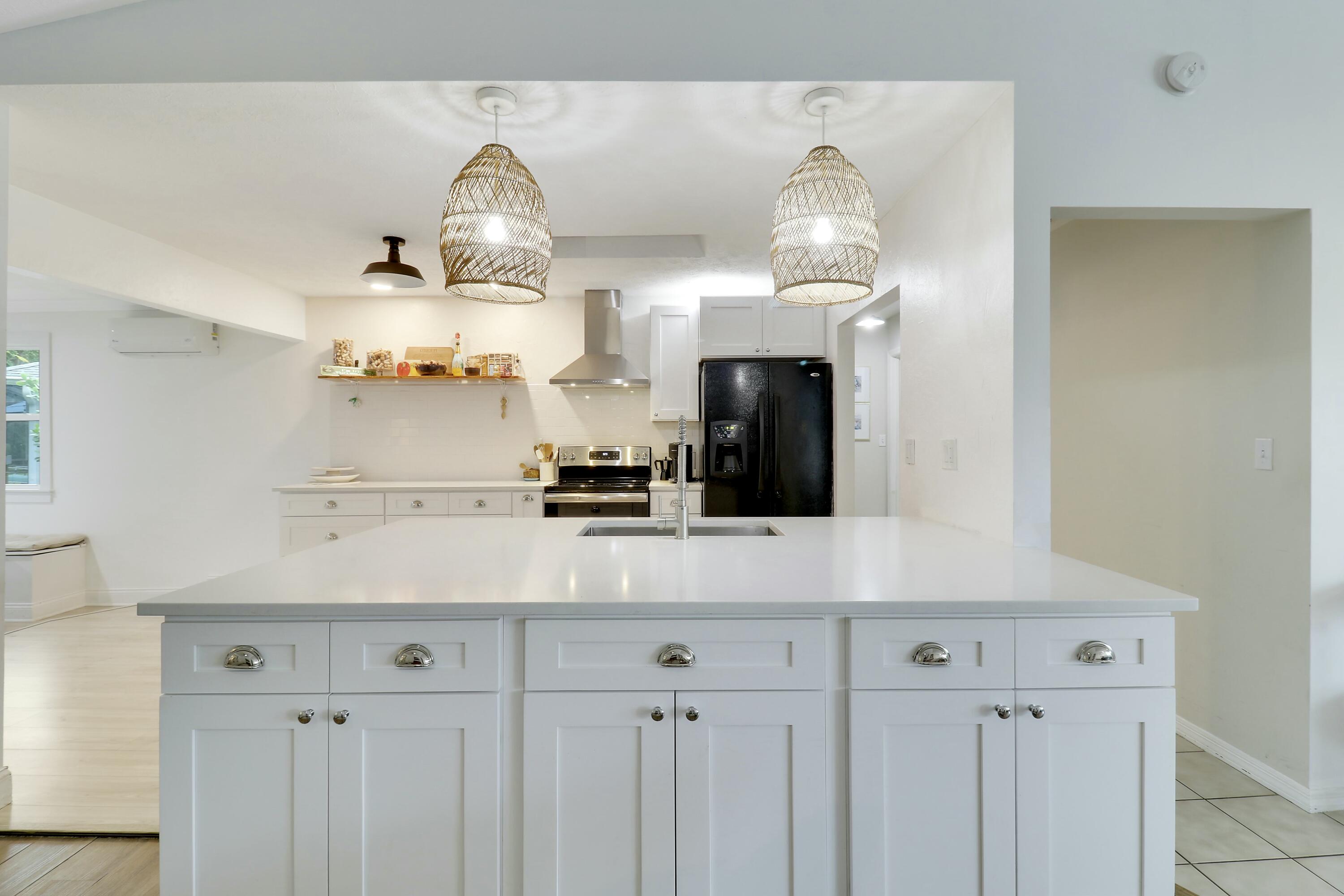 7843 Southeast Lexington Avenue Hobe Sound, FL 33455 - Photo 15 of 34 KITCHEN ISLAND