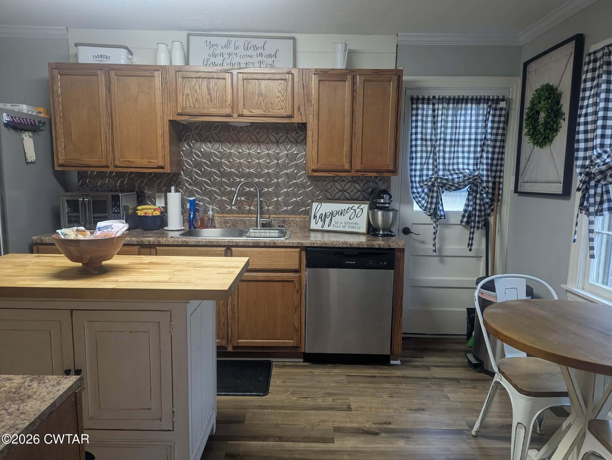 4072 Beech Bluff Road Beech Bluff, TN 38313 - Photo 14 of 51 a kitchen with a sink cabinets and wooden floor
