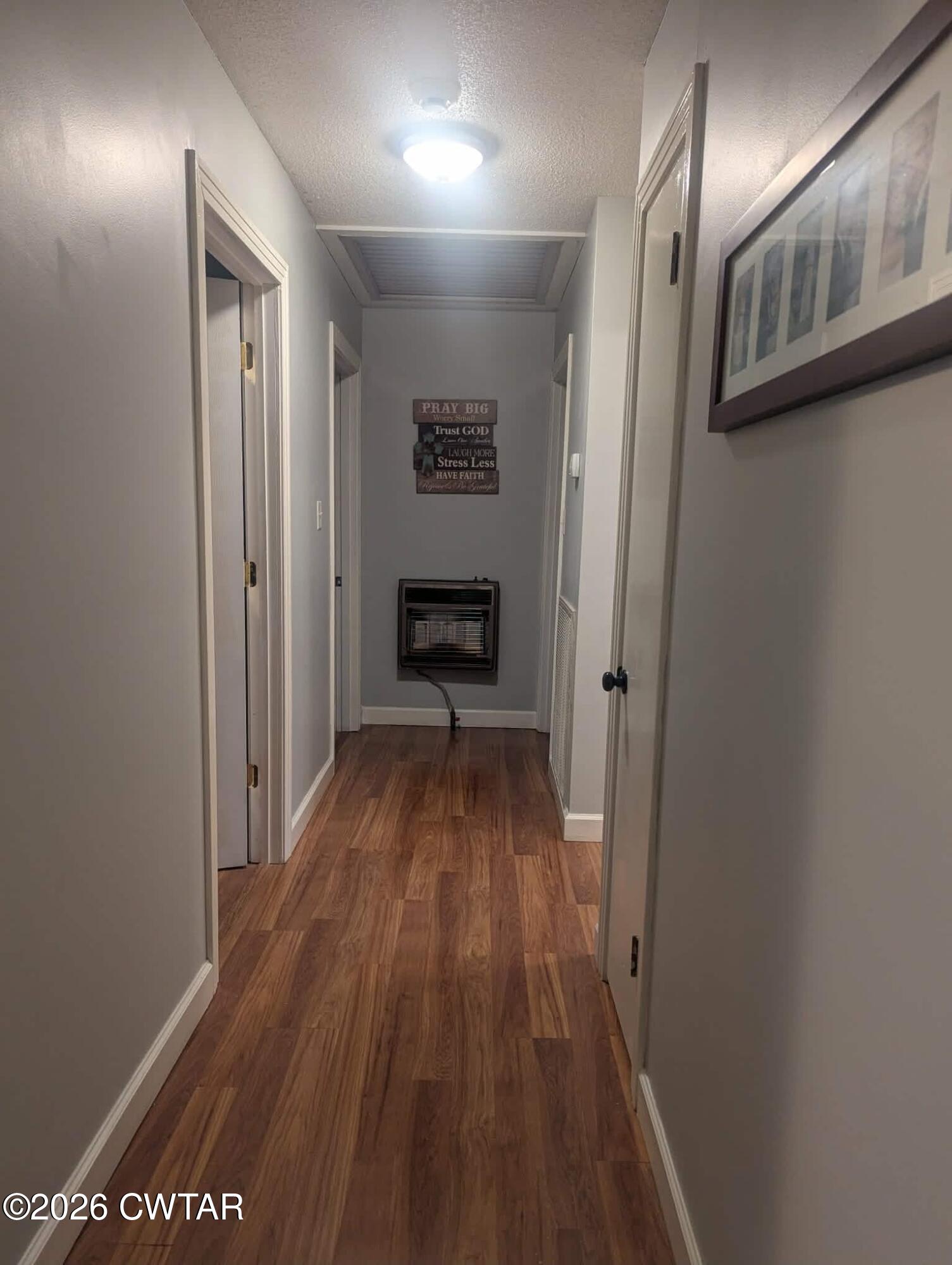 4072 Beech Bluff Road Beech Bluff, TN 38313 - Photo 20 of 51 a view of a hallway with wooden floor