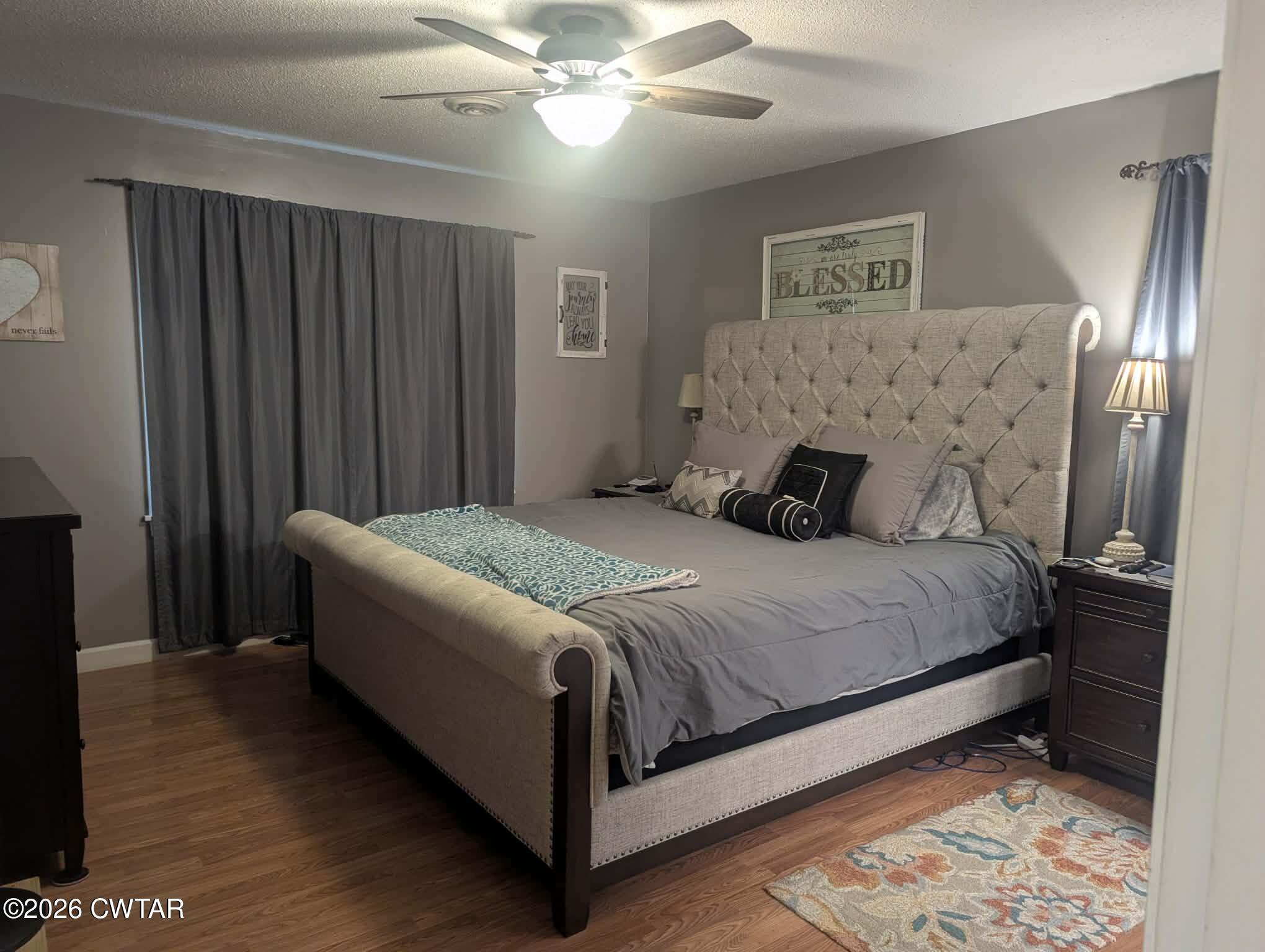 4072 Beech Bluff Road Beech Bluff, TN 38313 - Photo 23 of 51 a bedroom with a bed and a mirror