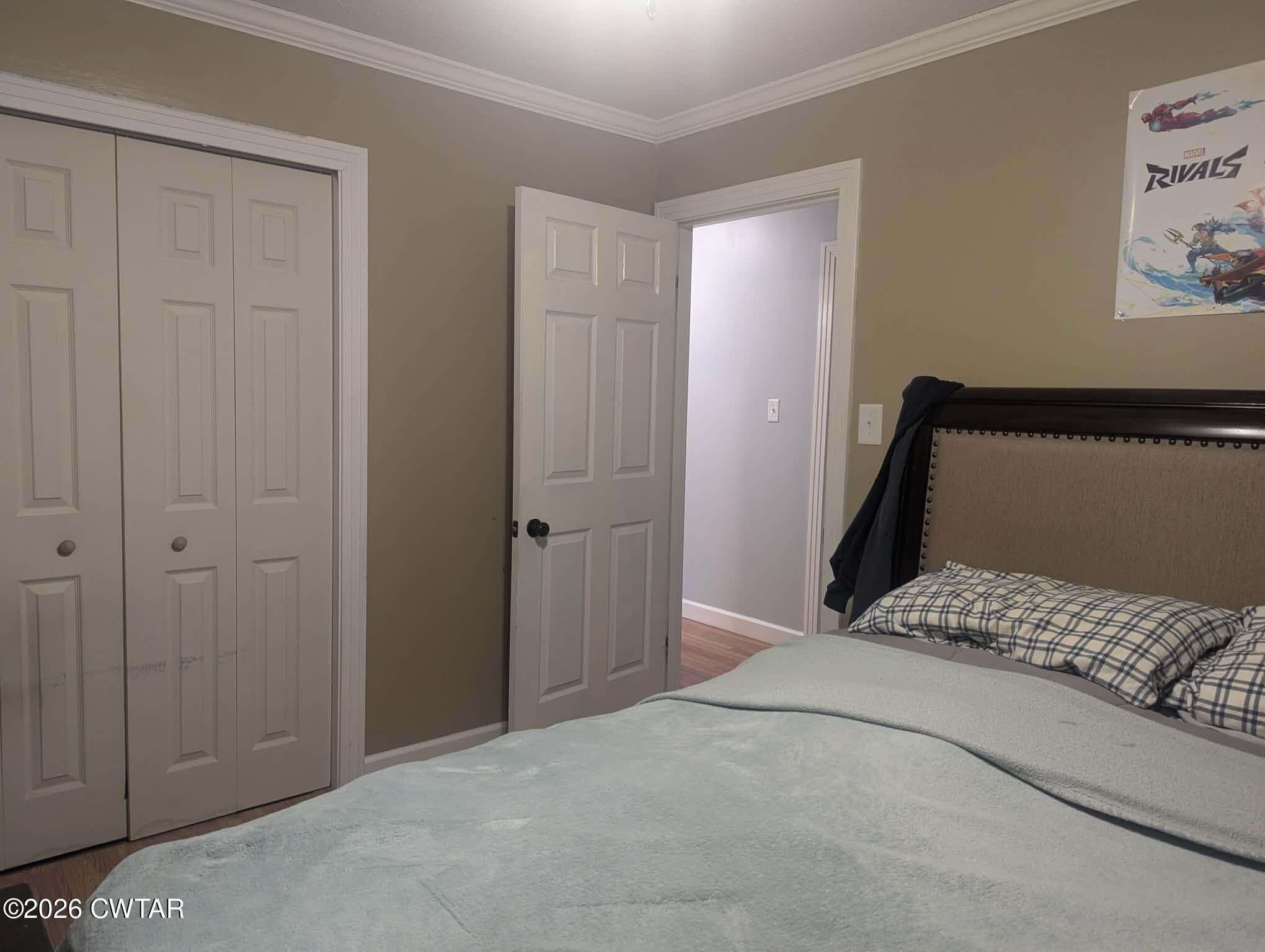 4072 Beech Bluff Road Beech Bluff, TN 38313 - Photo 26 of 51 a bedroom with a bed and a window