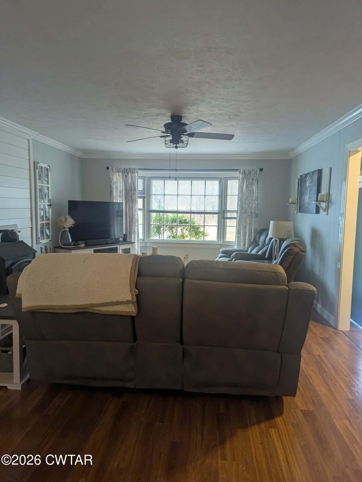 4072 Beech Bluff Road Beech Bluff, TN 38313 - Photo 3 of 51 a living room with a bed furniture and a large window