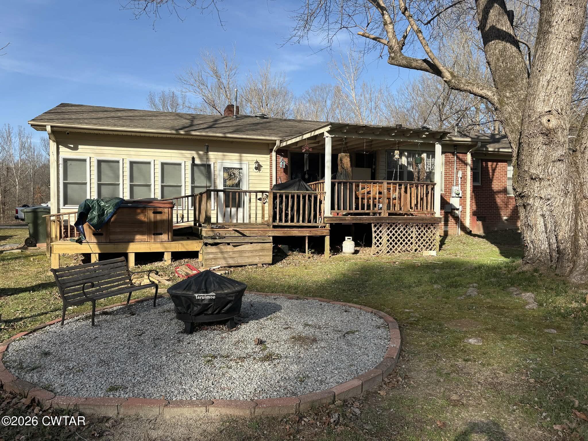 4072 Beech Bluff Road Beech Bluff, TN 38313 - Photo 38 of 51 a view of a house with backyard porch and sitting area