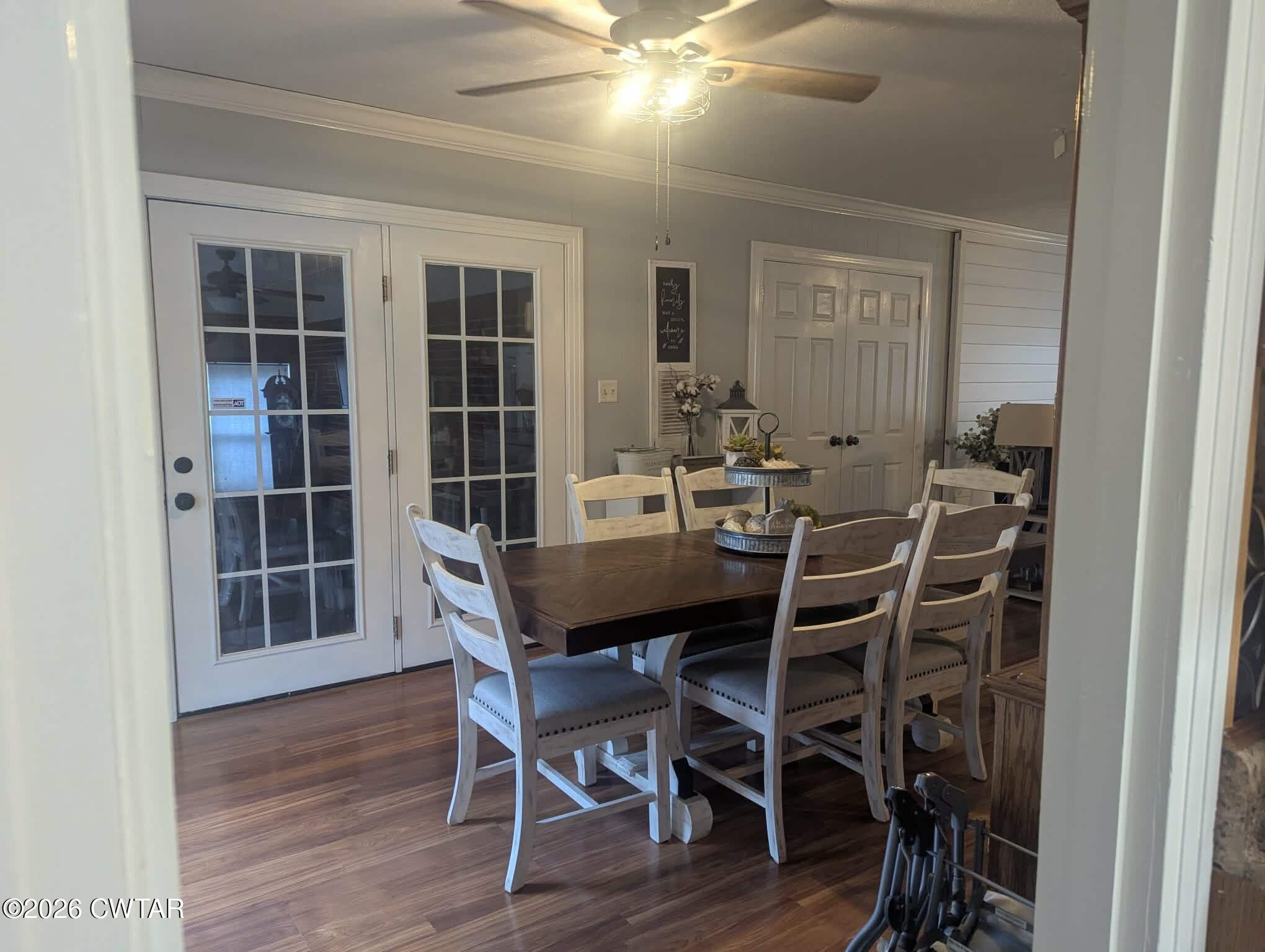 4072 Beech Bluff Road Beech Bluff, TN 38313 - Photo 10 of 51 a view of a dining room with furniture and wooden floor