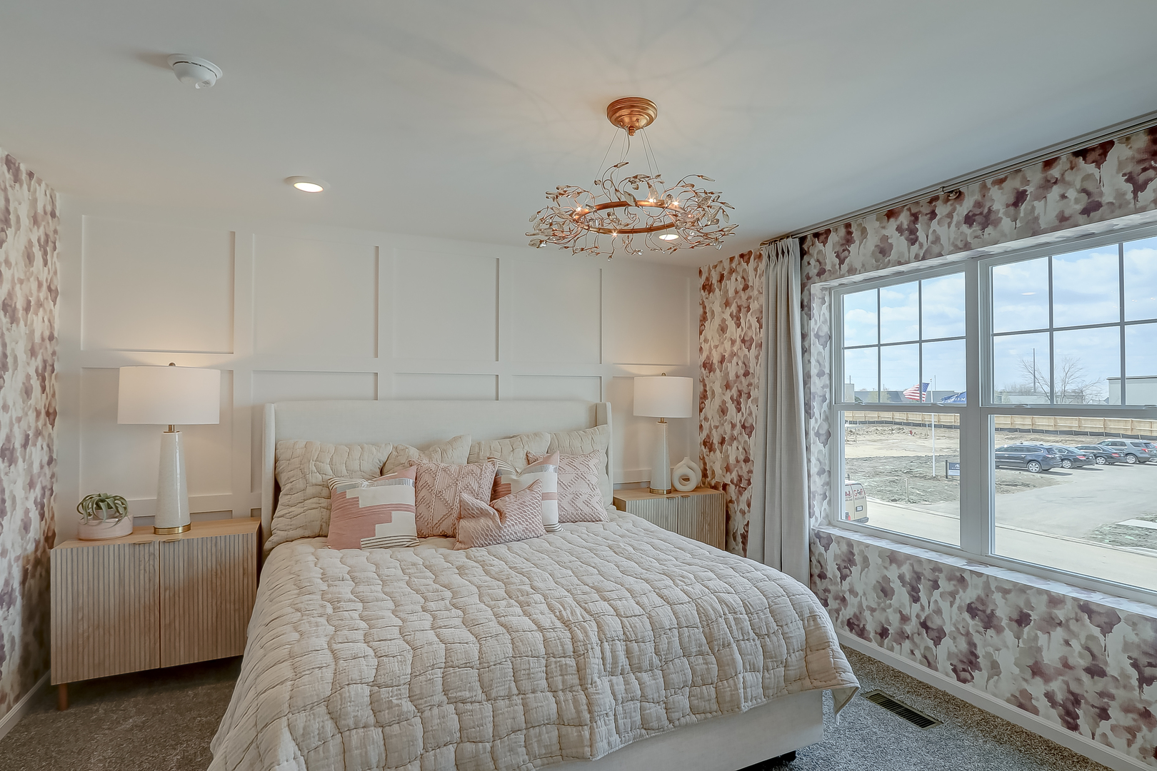 475 Comstock Road South Elgin, IL 60177 - Photo 18 of 31 a bedroom with a large bed and a chandelier