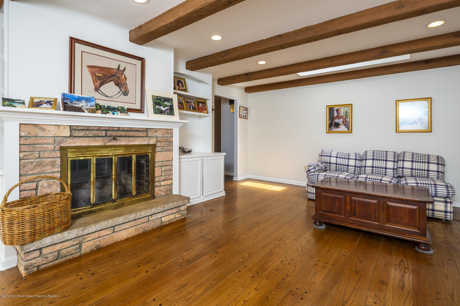 10 Green Hill Road Colts Neck, NJ 07722 - Photo 22 of 33 a bedroom with furniture and a fireplace