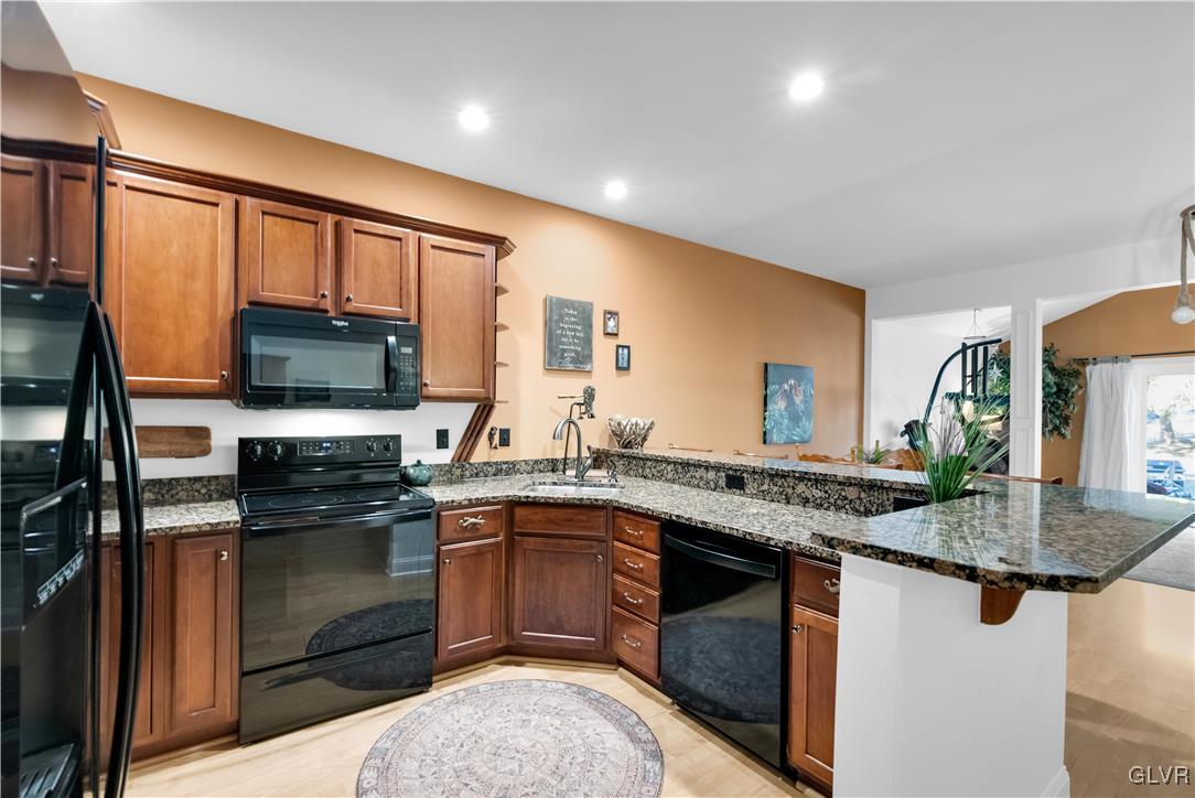 2602 Bridgets Way Allentown, PA 18103 - Photo 9 of 38 Kitchen offers granite countertops, bar-height bre