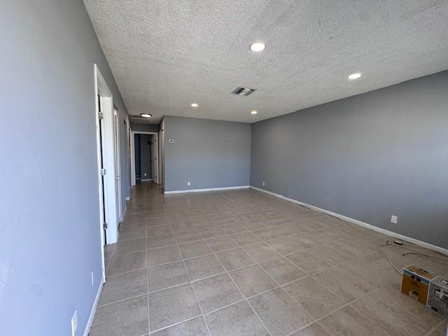 1109 West 28th Street, Unit 4 Riviera Beach, FL 33404 - Photo 11 of 12 an empty room with a bathroom