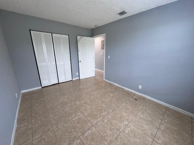 1109 West 28th Street, Unit 4 Riviera Beach, FL 33404 - Photo 4 of 12 wooden floor in an empty room
