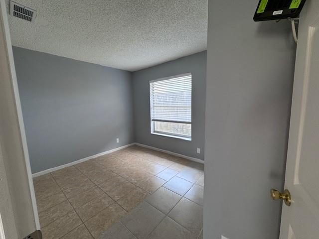 1109 West 28th Street, Unit 4 Riviera Beach, FL 33404 - Photo 5 of 12 a view of an empty room with a window